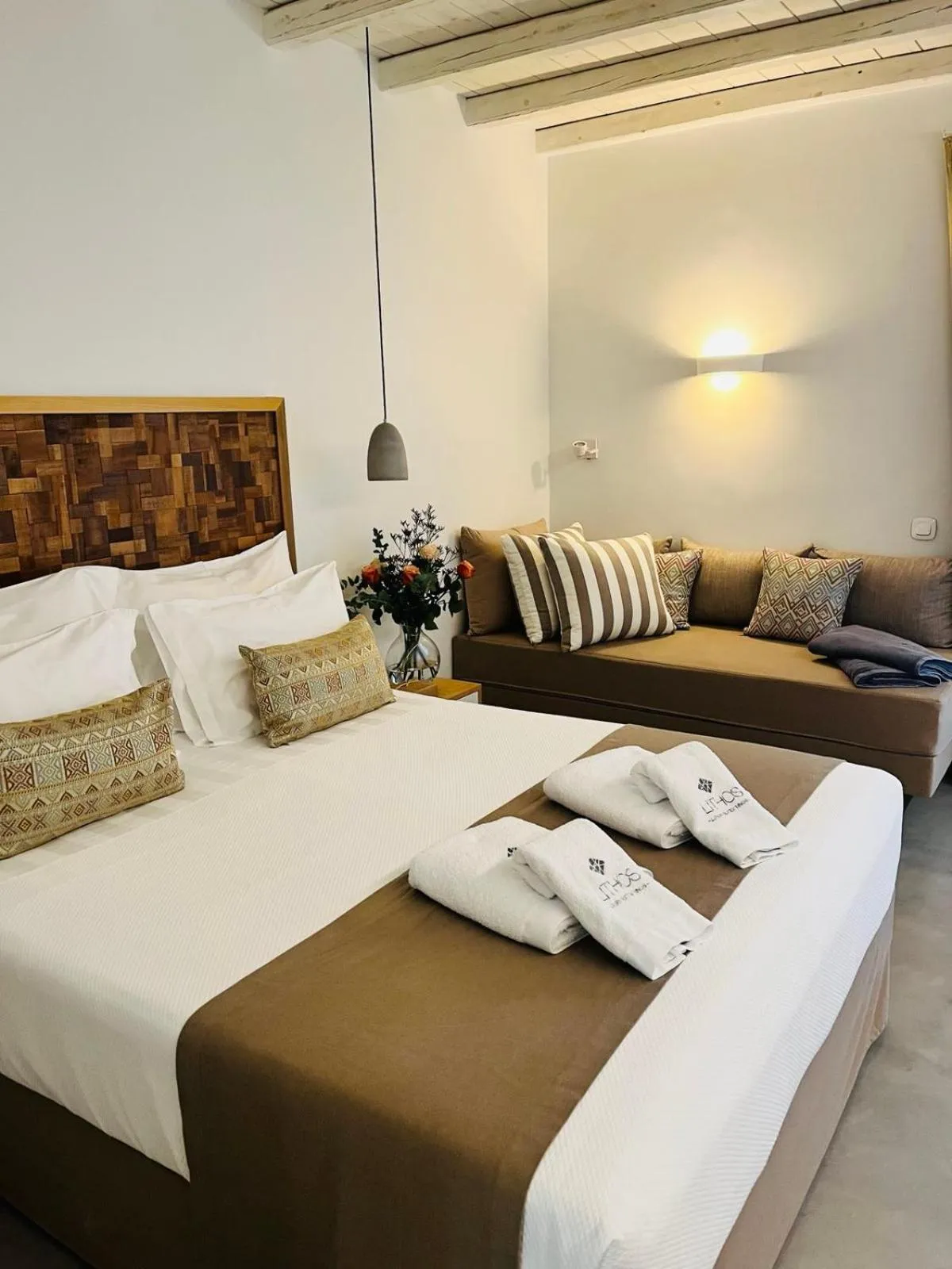 Bed in Lithos Luxury Suites