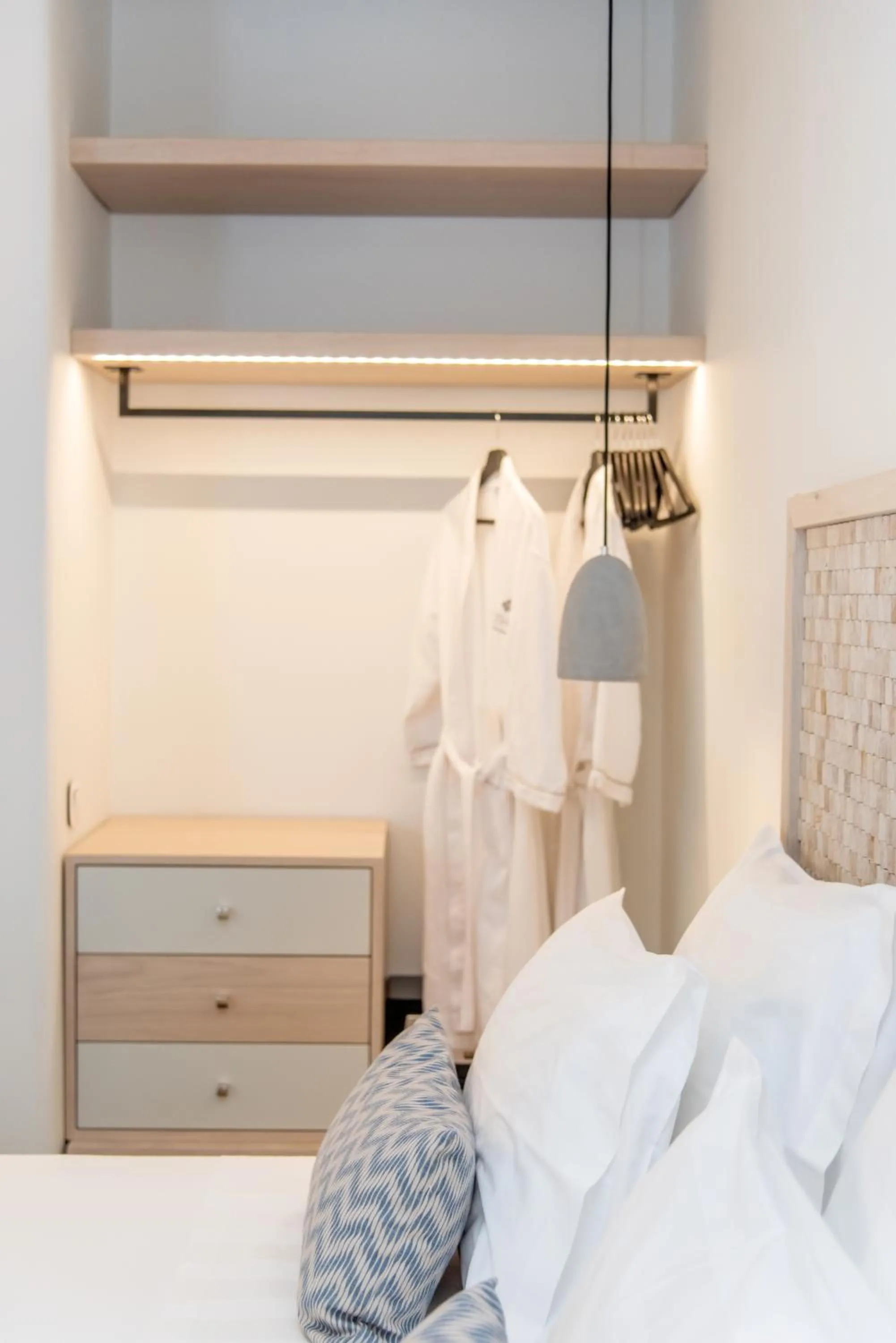 Bed in Lithos Luxury Suites