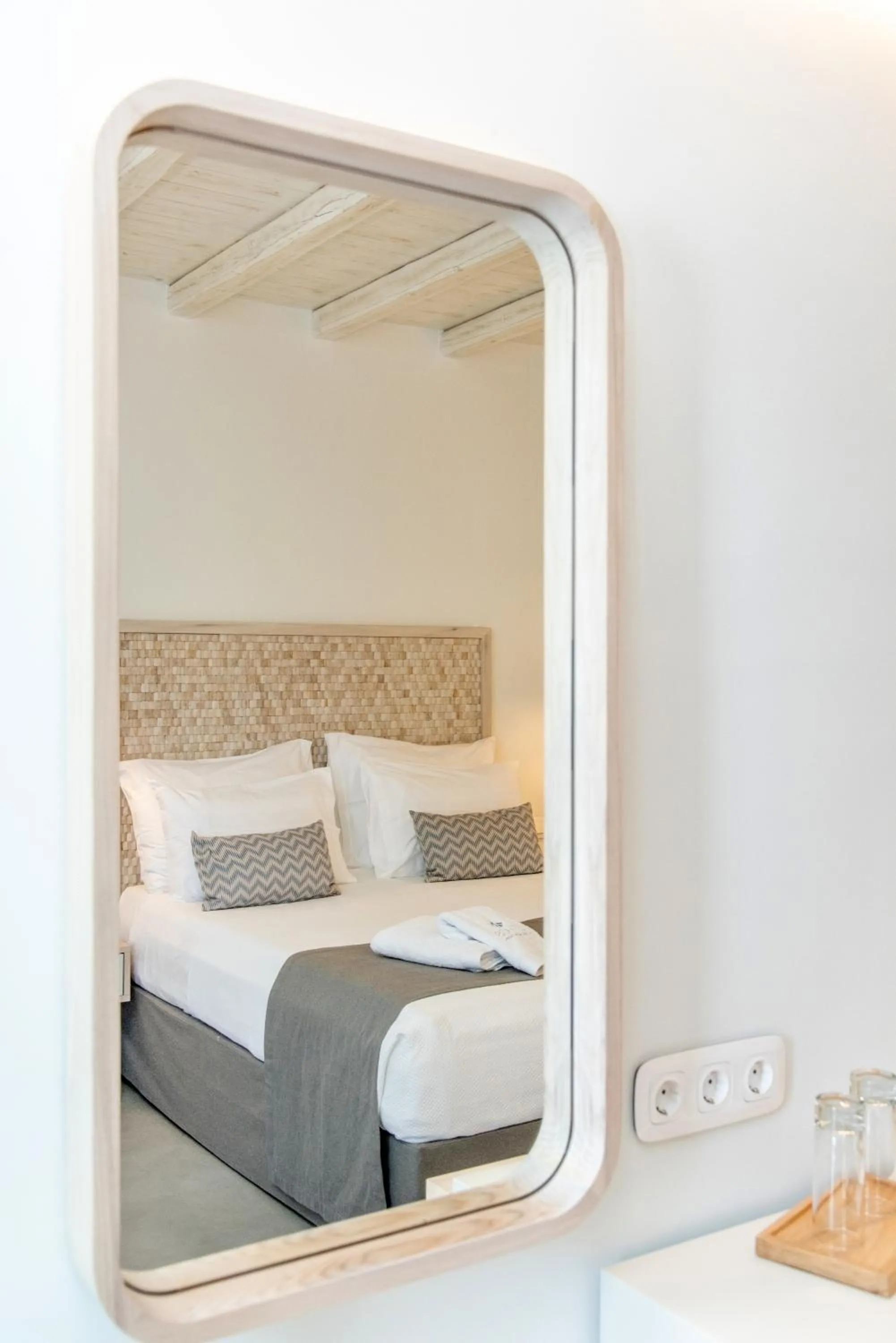 Bed in Lithos Luxury Suites