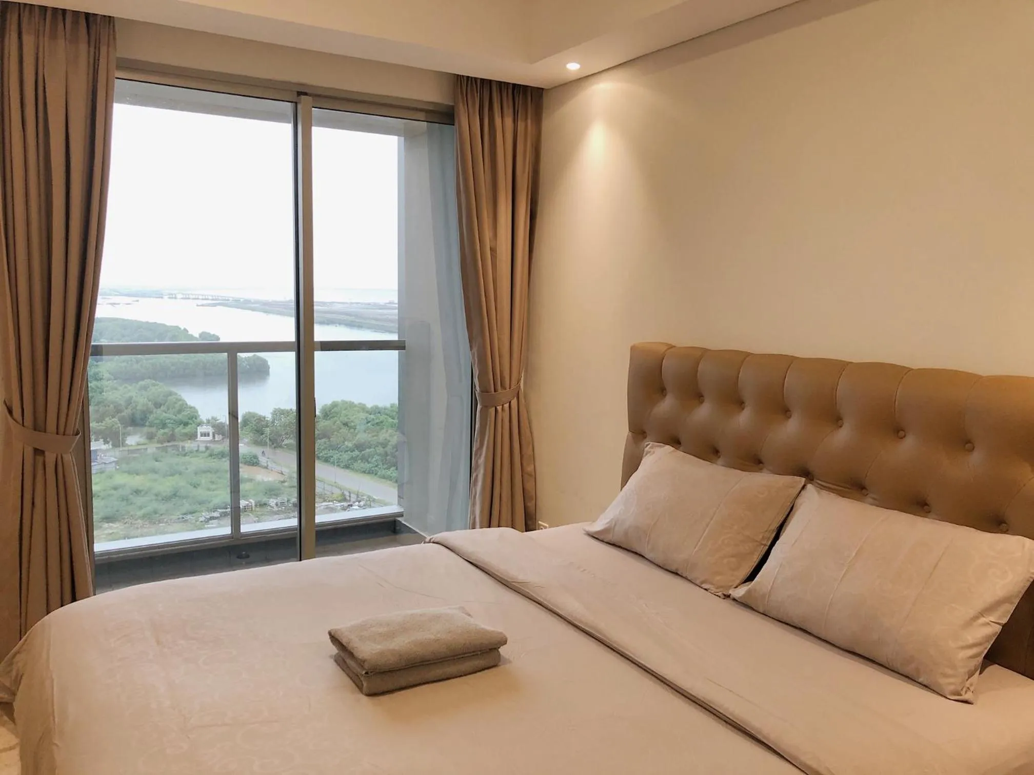 Bed in Gold Coast PIK Sea View Apartments by LongeSuites
