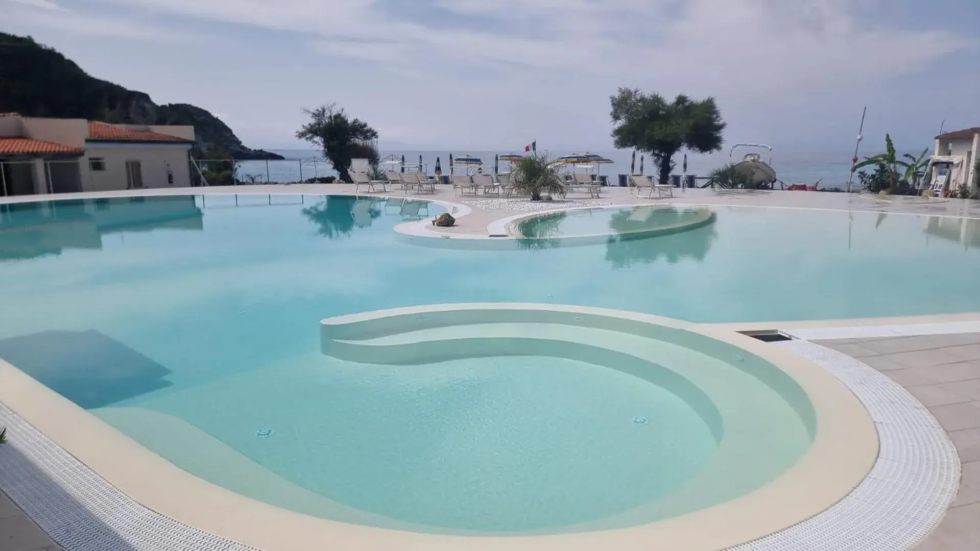 Double Room with Balcony and Sea View in Villaggio Quattro Scogli Double Room with Balcony and Sea View in Villaggio Quattro Scogli