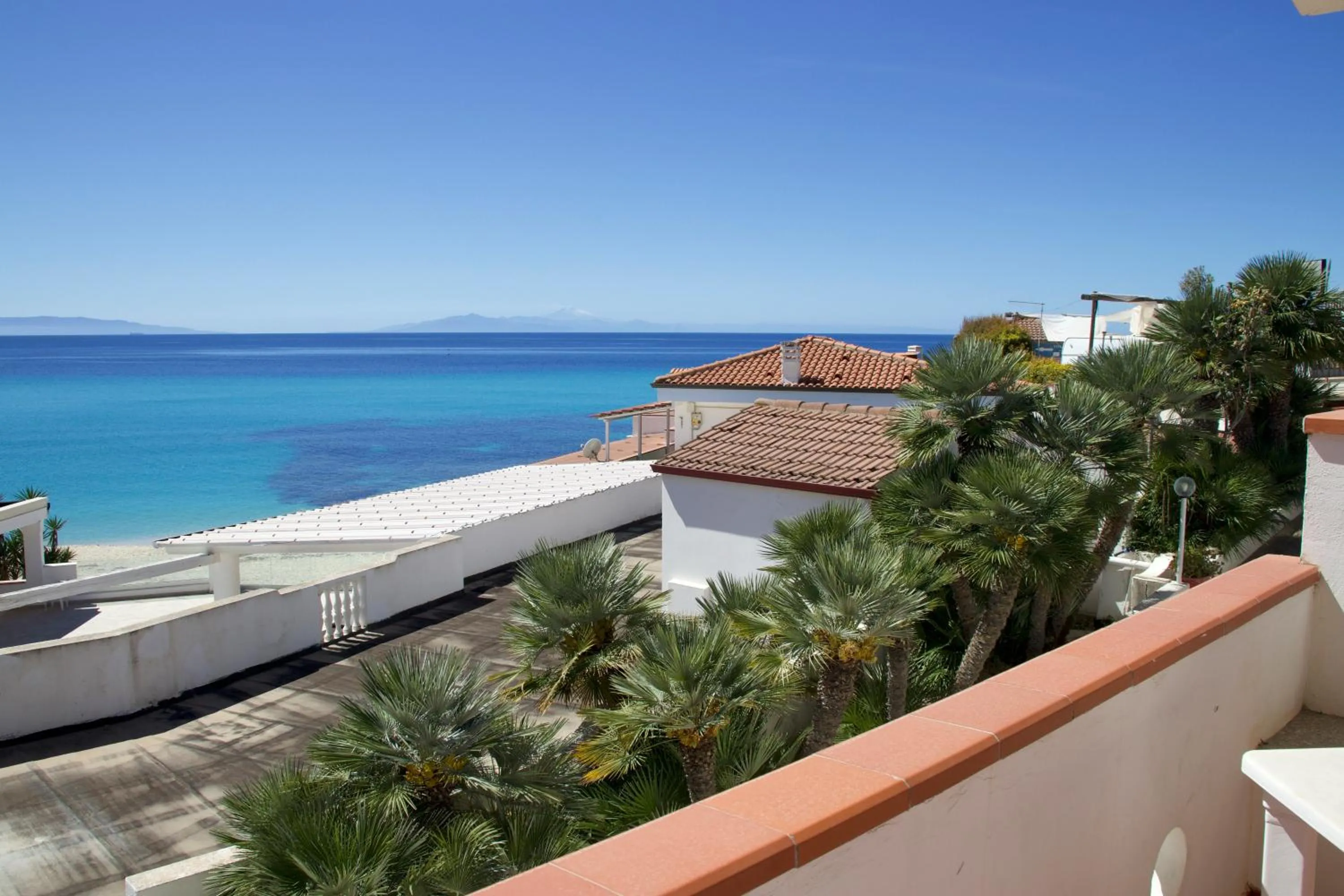 Two-Bedroom Apartment with Sea View in Villaggio Quattro Scogli