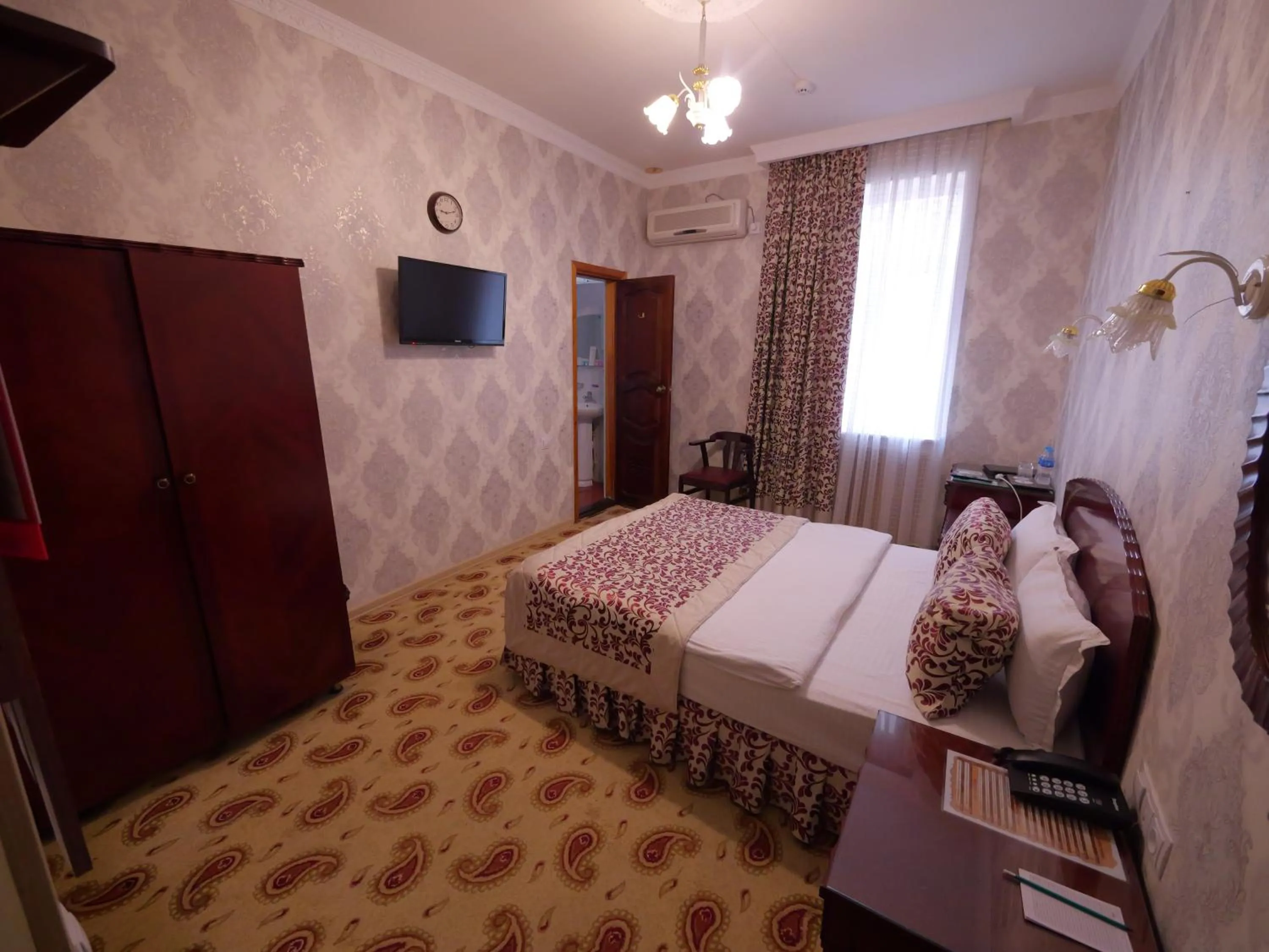 Bed in Asia Hotel Fergana