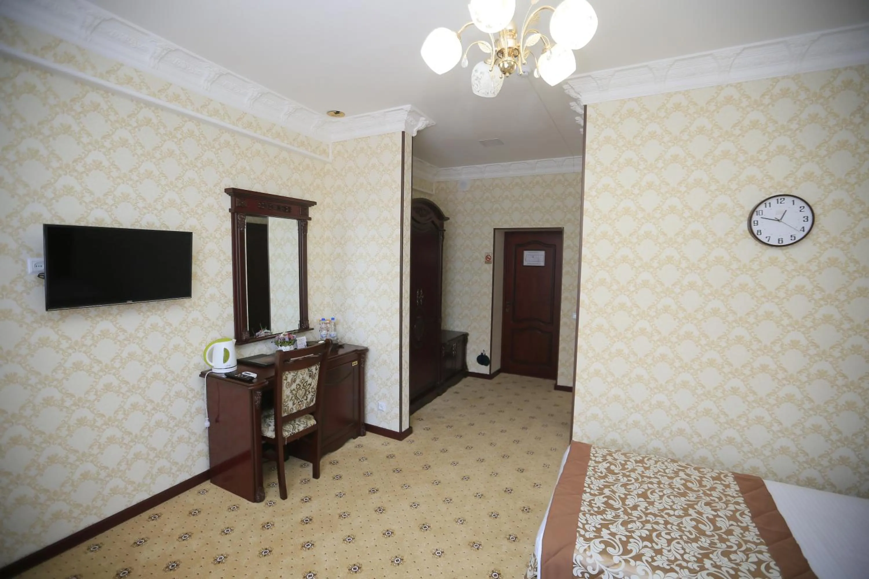 TV and multimedia, Bed in Asia Hotel Fergana