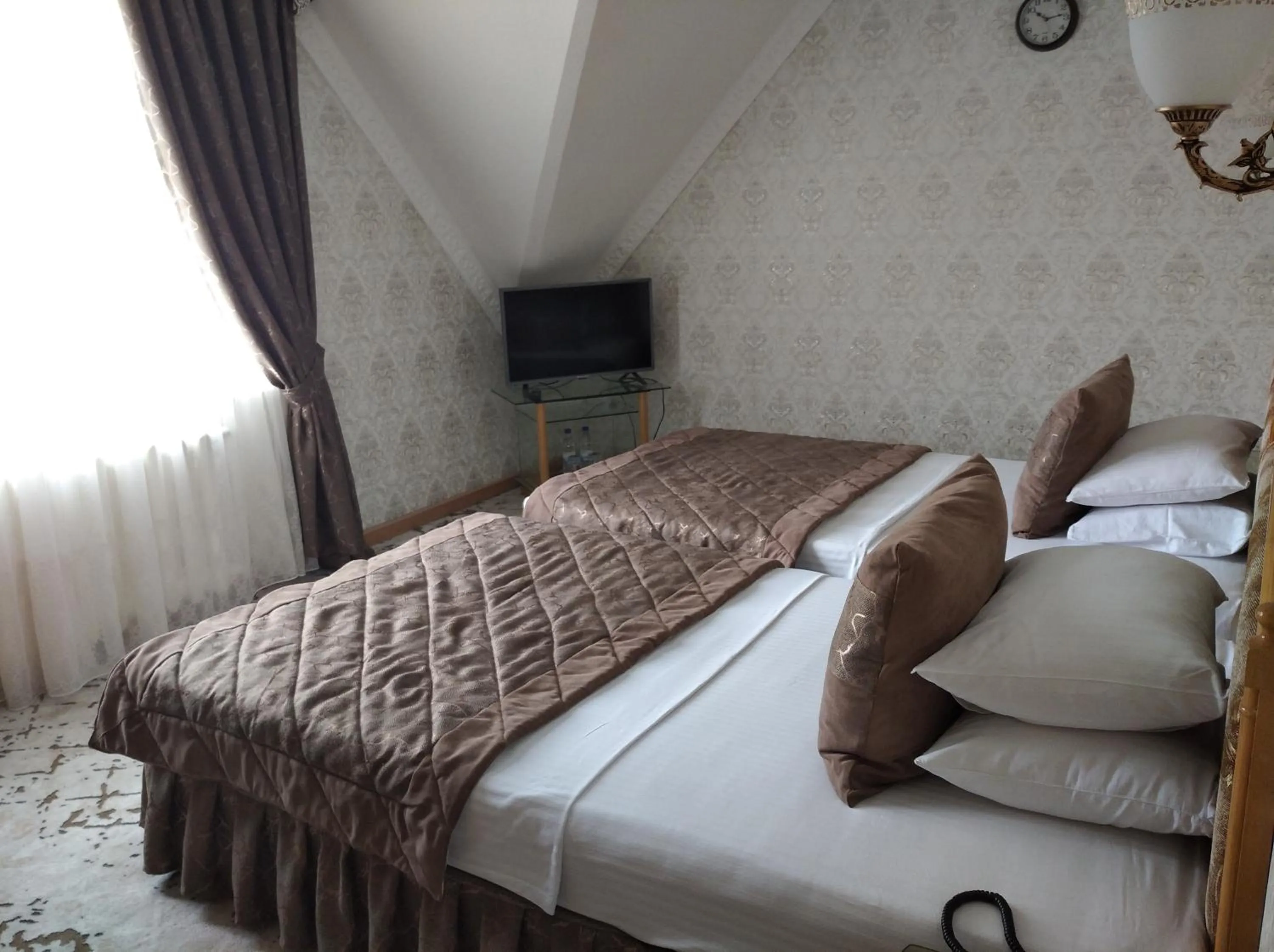 Bed in Asia Hotel Fergana