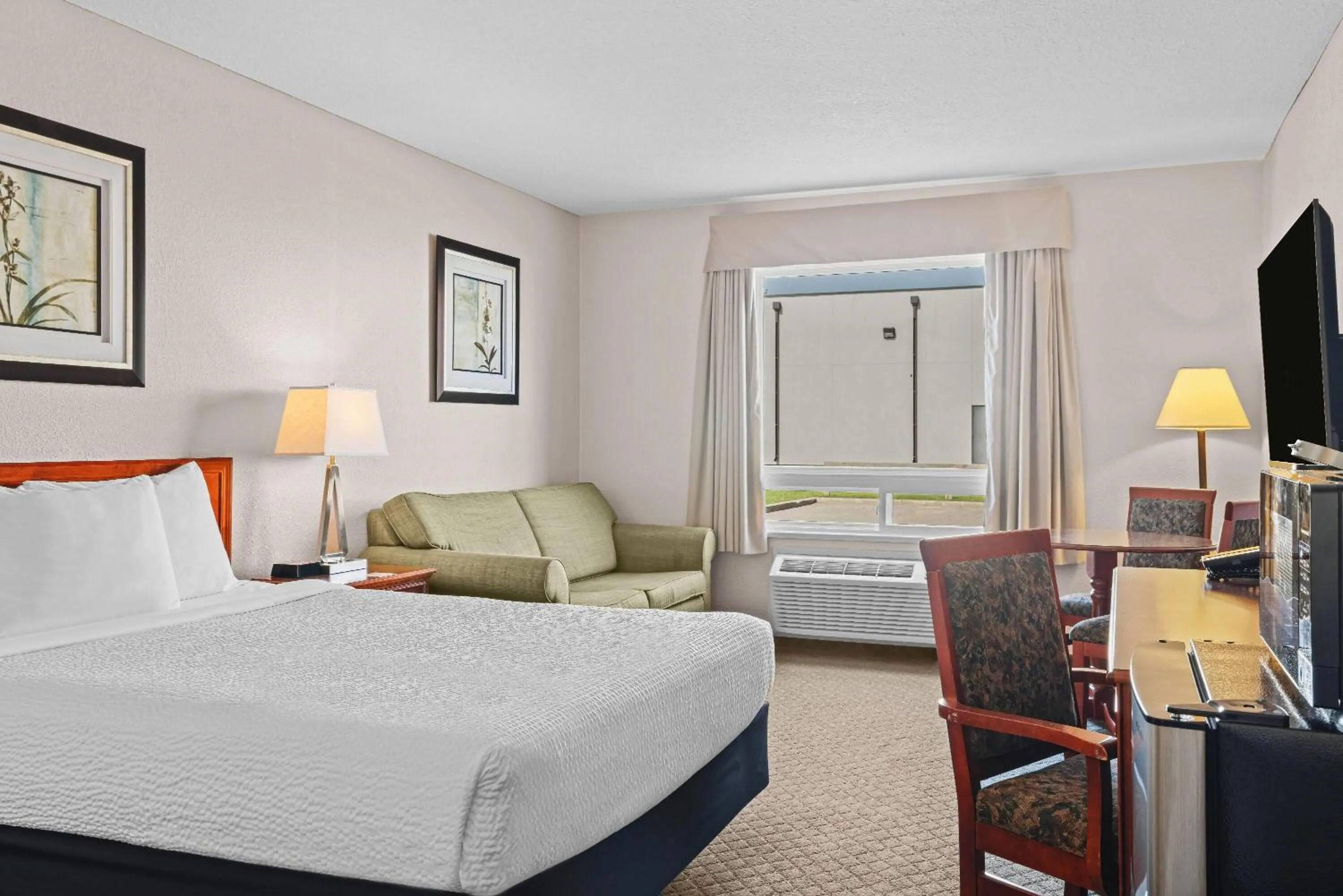 Bed in Days Inn & Suites by Wyndham Winkler