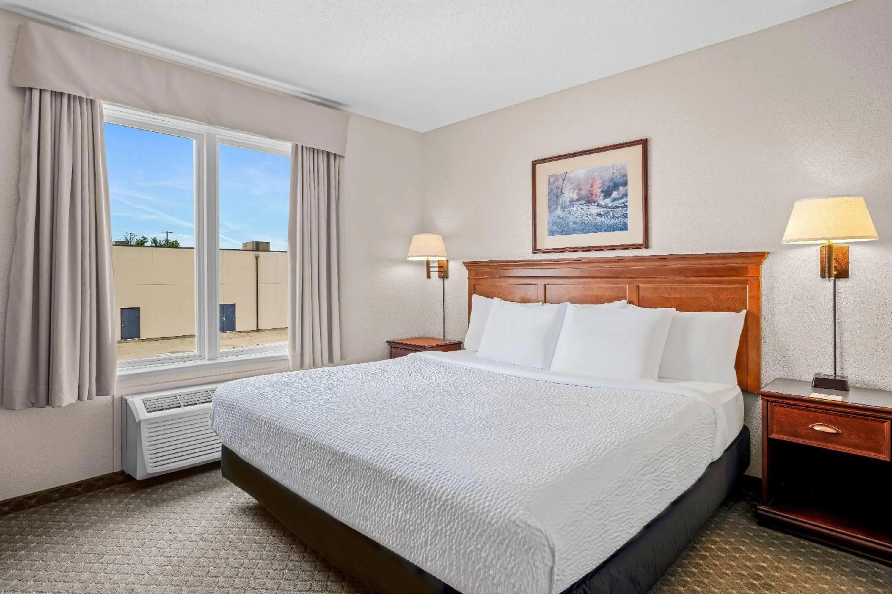 Photo of the whole room, Bed in Days Inn & Suites by Wyndham Winkler