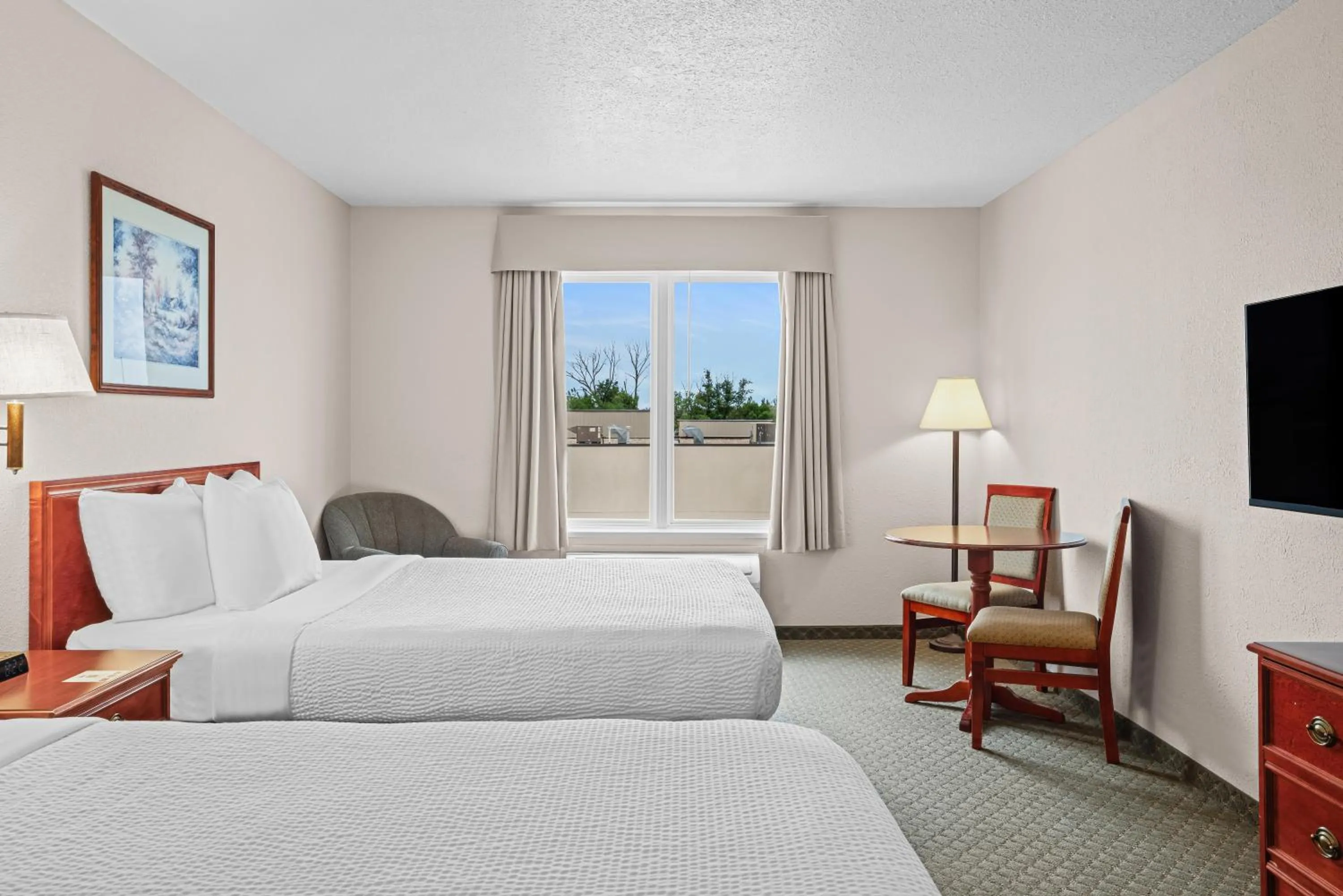 Bed in Days Inn & Suites by Wyndham Winkler