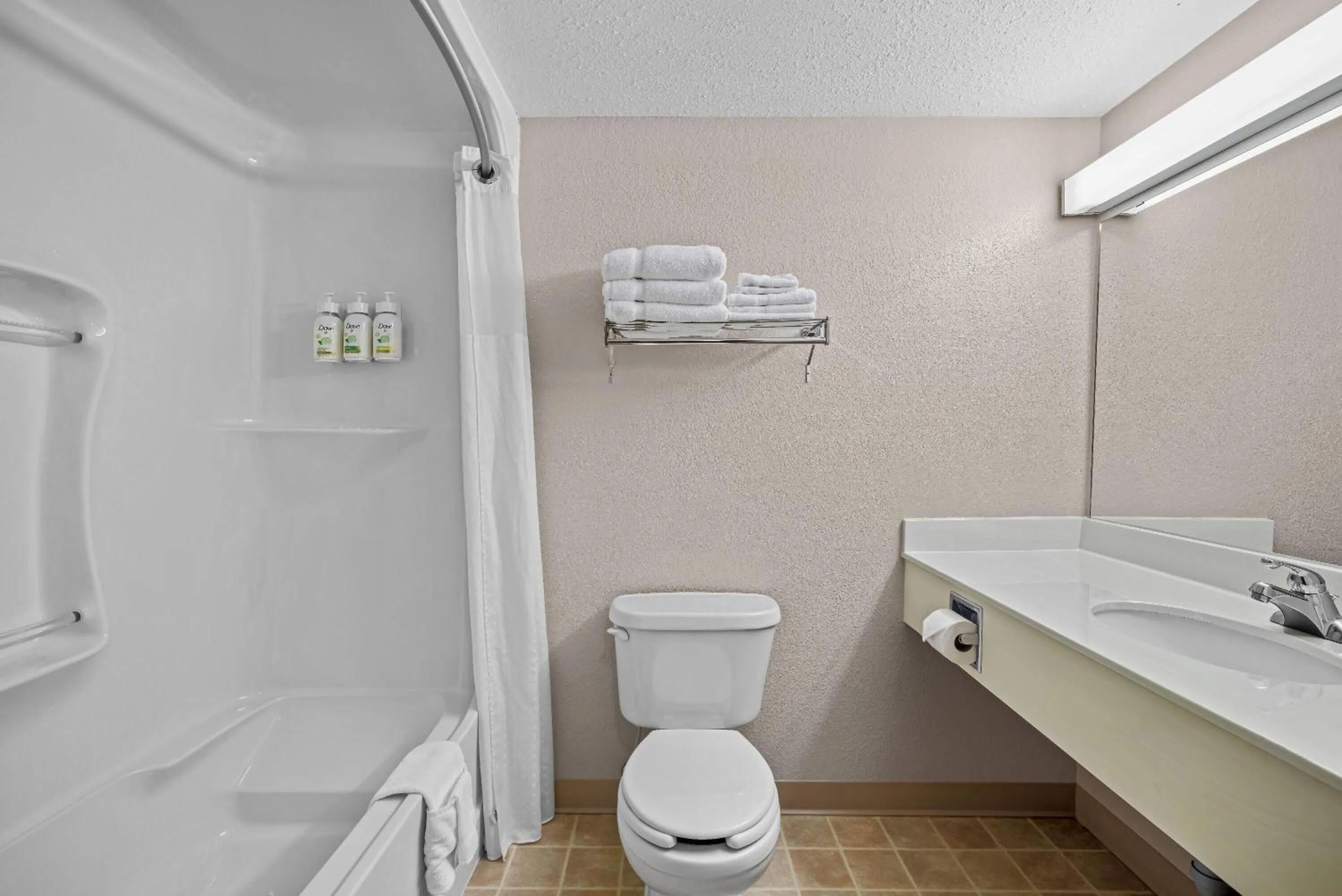 Bathroom in Days Inn & Suites by Wyndham Winkler