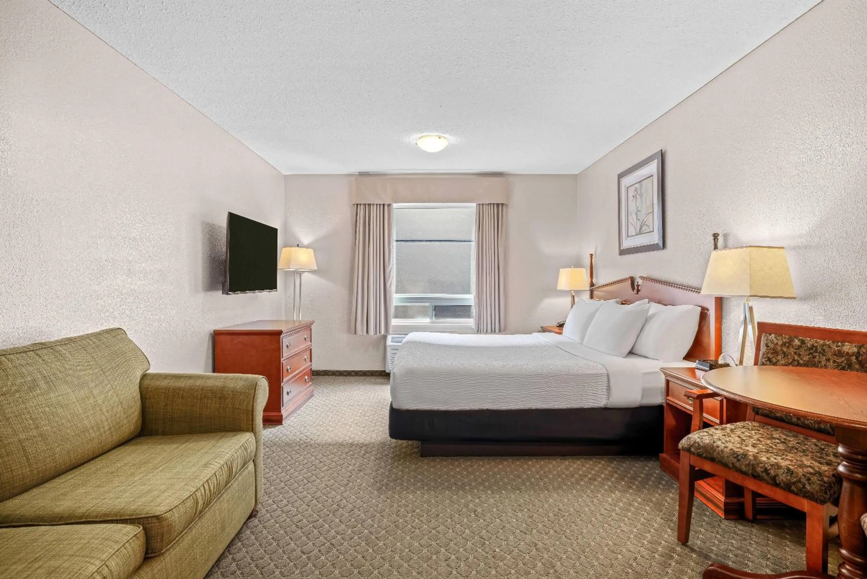 Bed in Days Inn & Suites by Wyndham Winkler