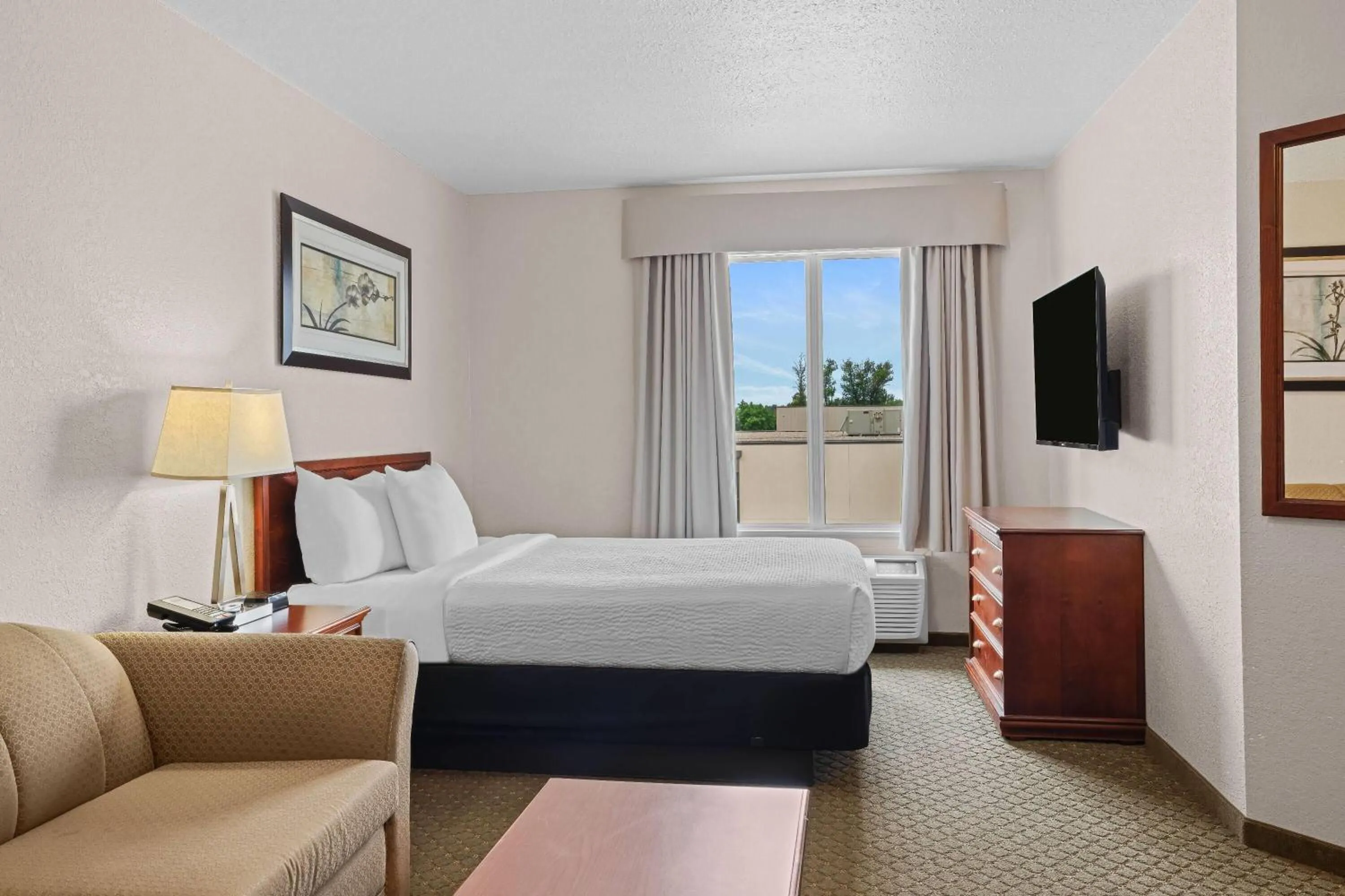 Bed in Days Inn & Suites by Wyndham Winkler