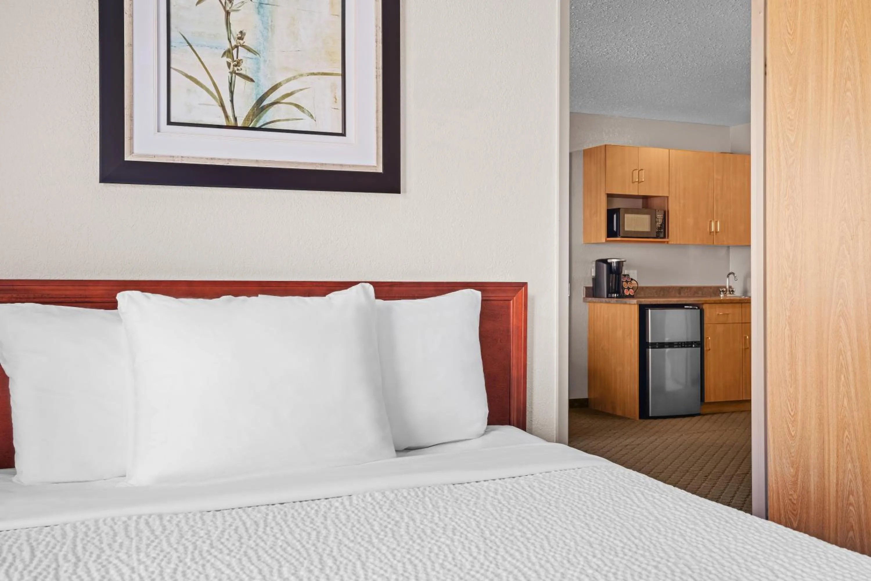 Bed in Days Inn & Suites by Wyndham Winkler