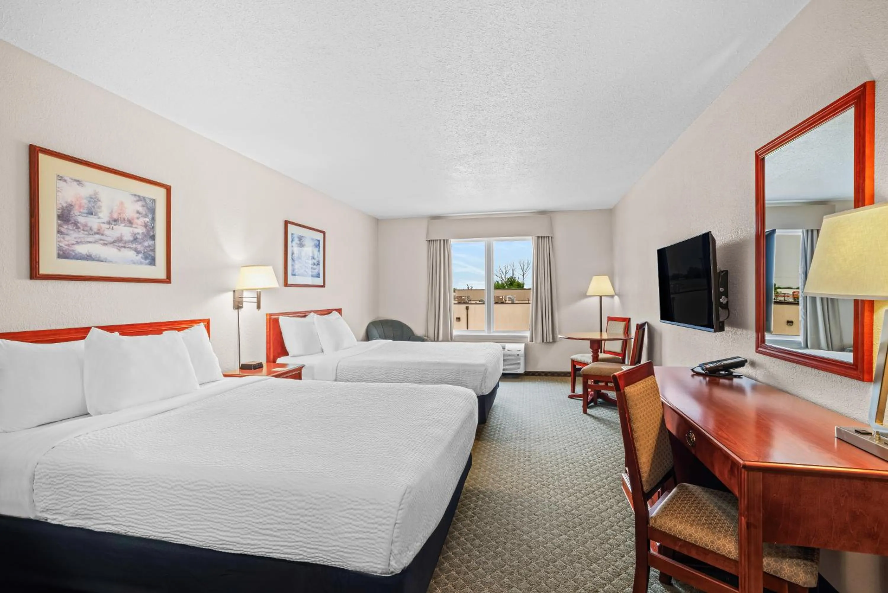 Bed in Days Inn & Suites by Wyndham Winkler