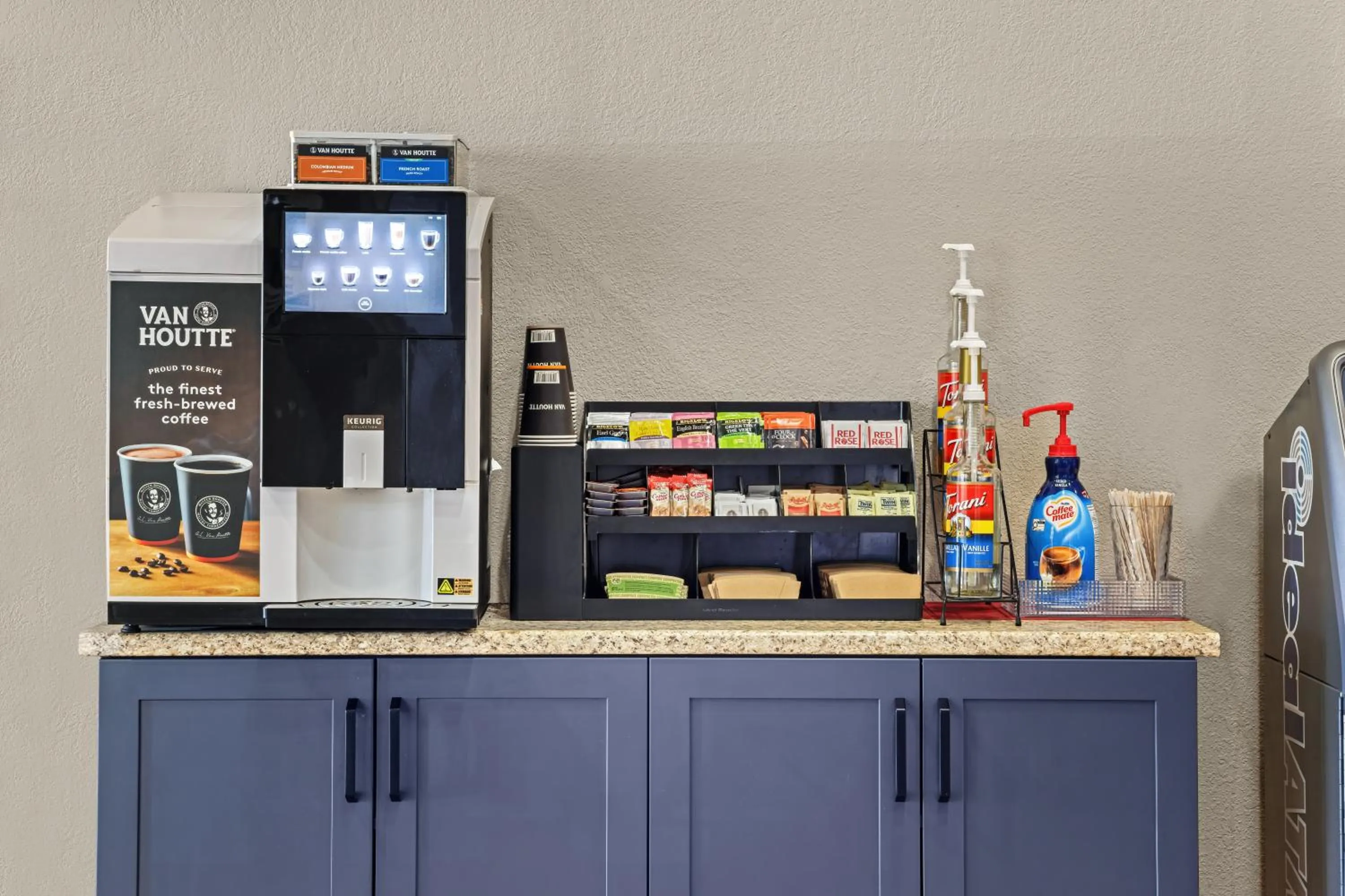 Coffee/tea facilities in Days Inn & Suites by Wyndham Winkler