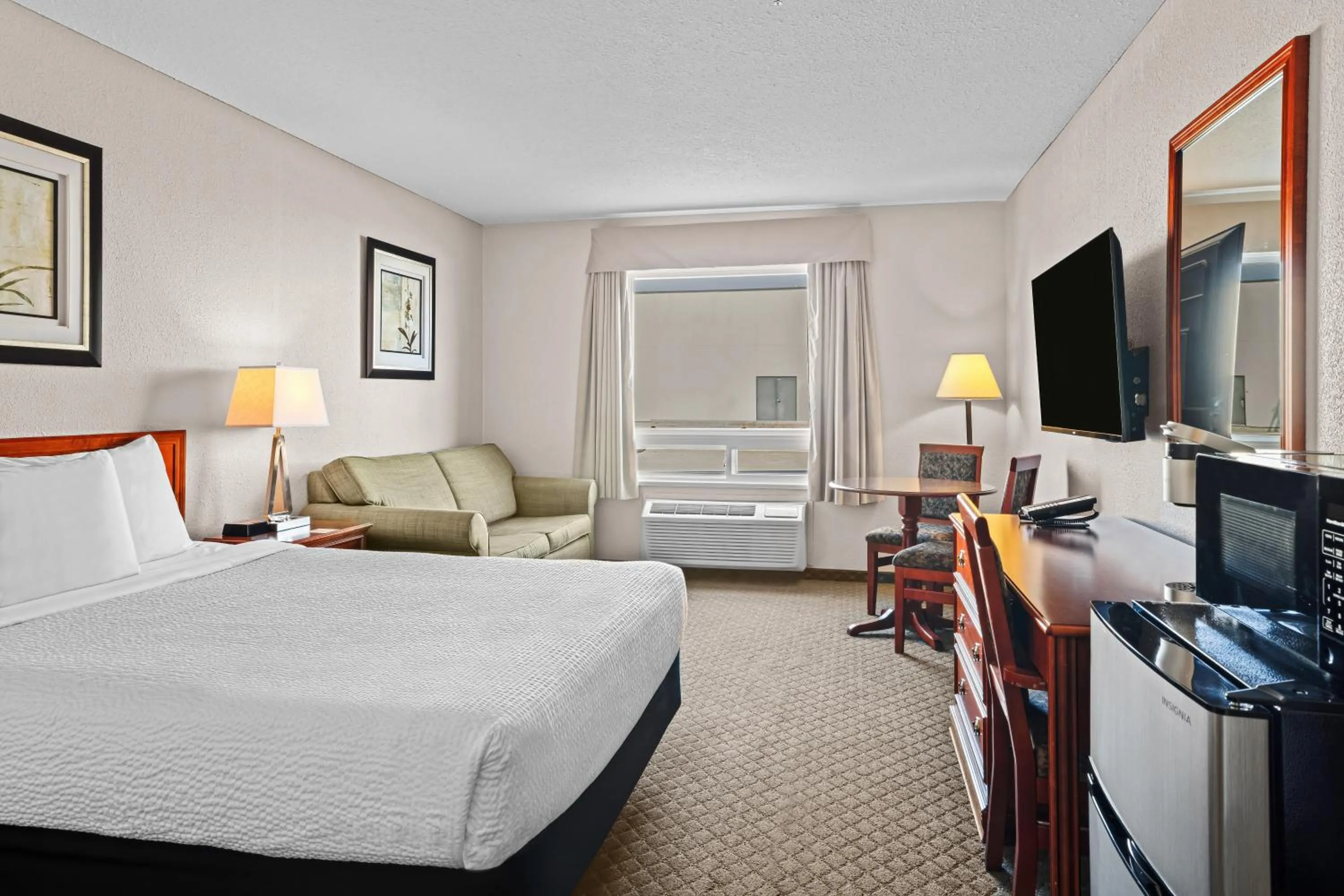 Bed in Days Inn & Suites by Wyndham Winkler