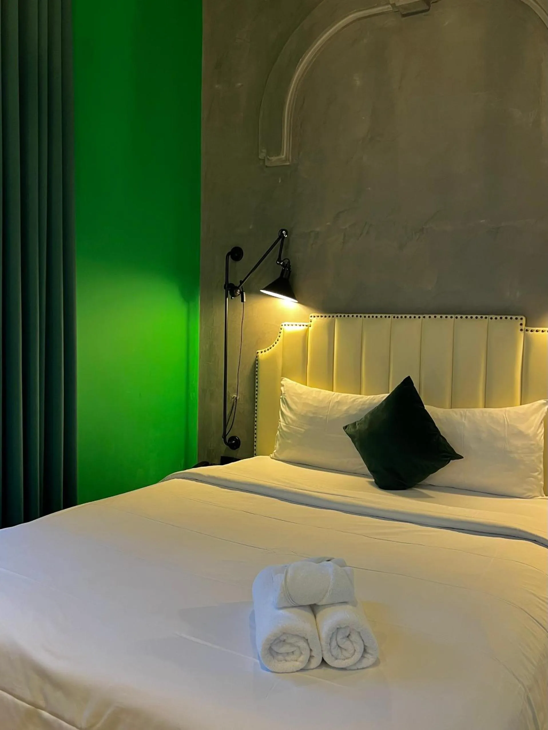 Bed in HOTEL le JARDIN SECRET saigon