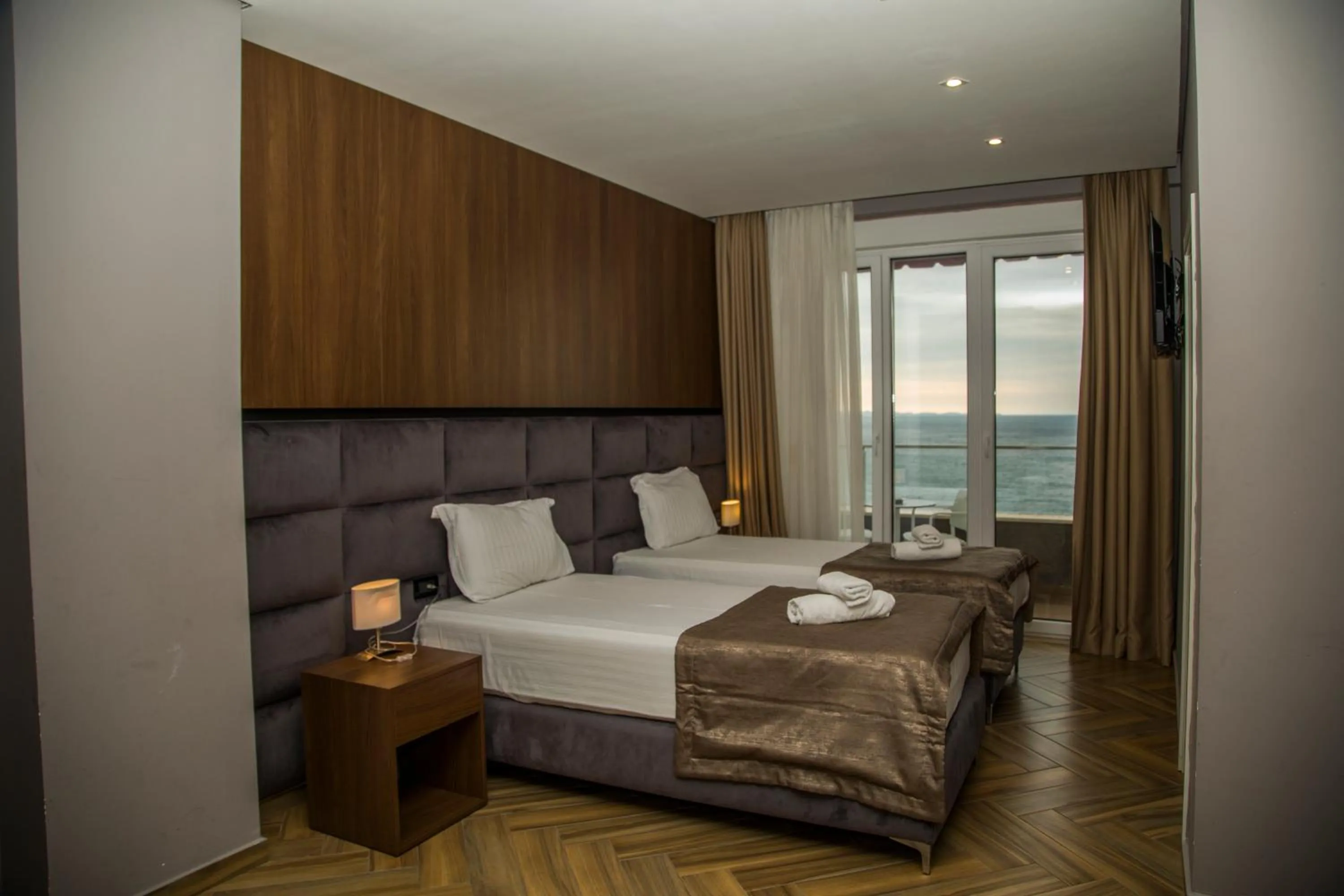 Bed in Twin Towers Hotel City & Beach Resort