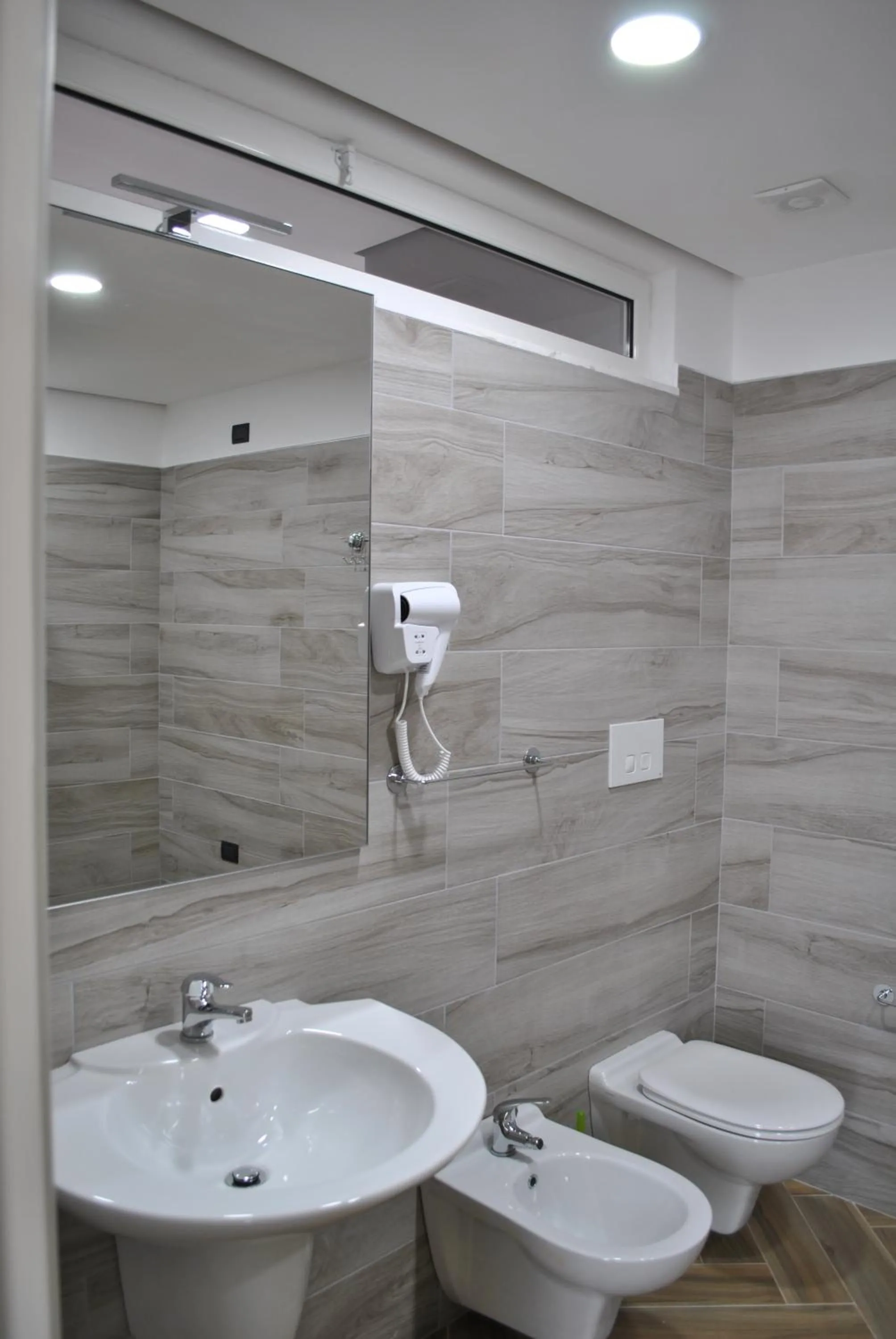 Toilet in Twin Towers Hotel City & Beach Resort
