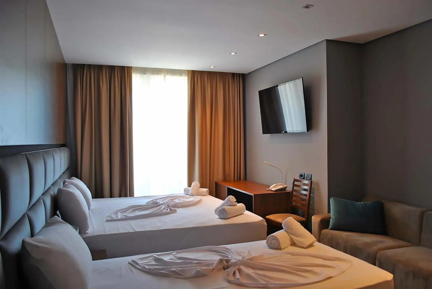 Bed in Twin Towers Hotel City & Beach Resort
