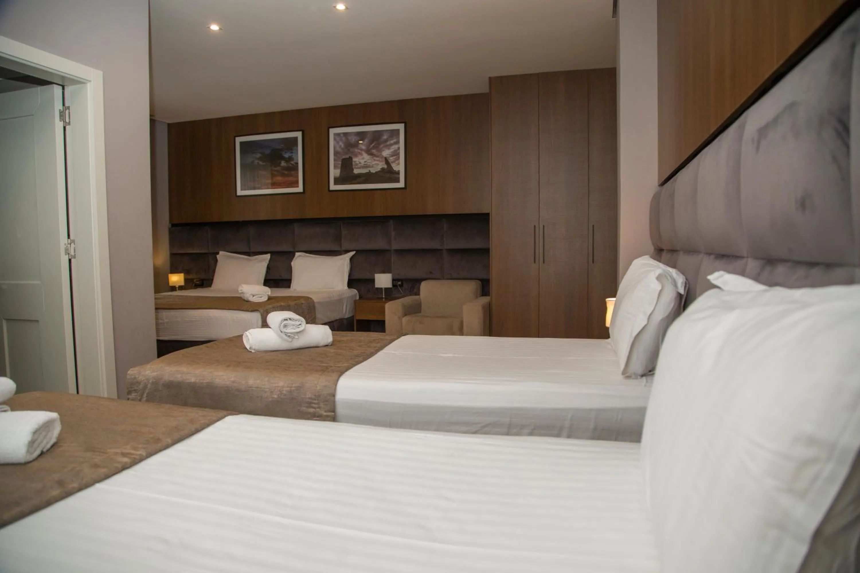 Bed in Twin Towers Hotel City & Beach Resort
