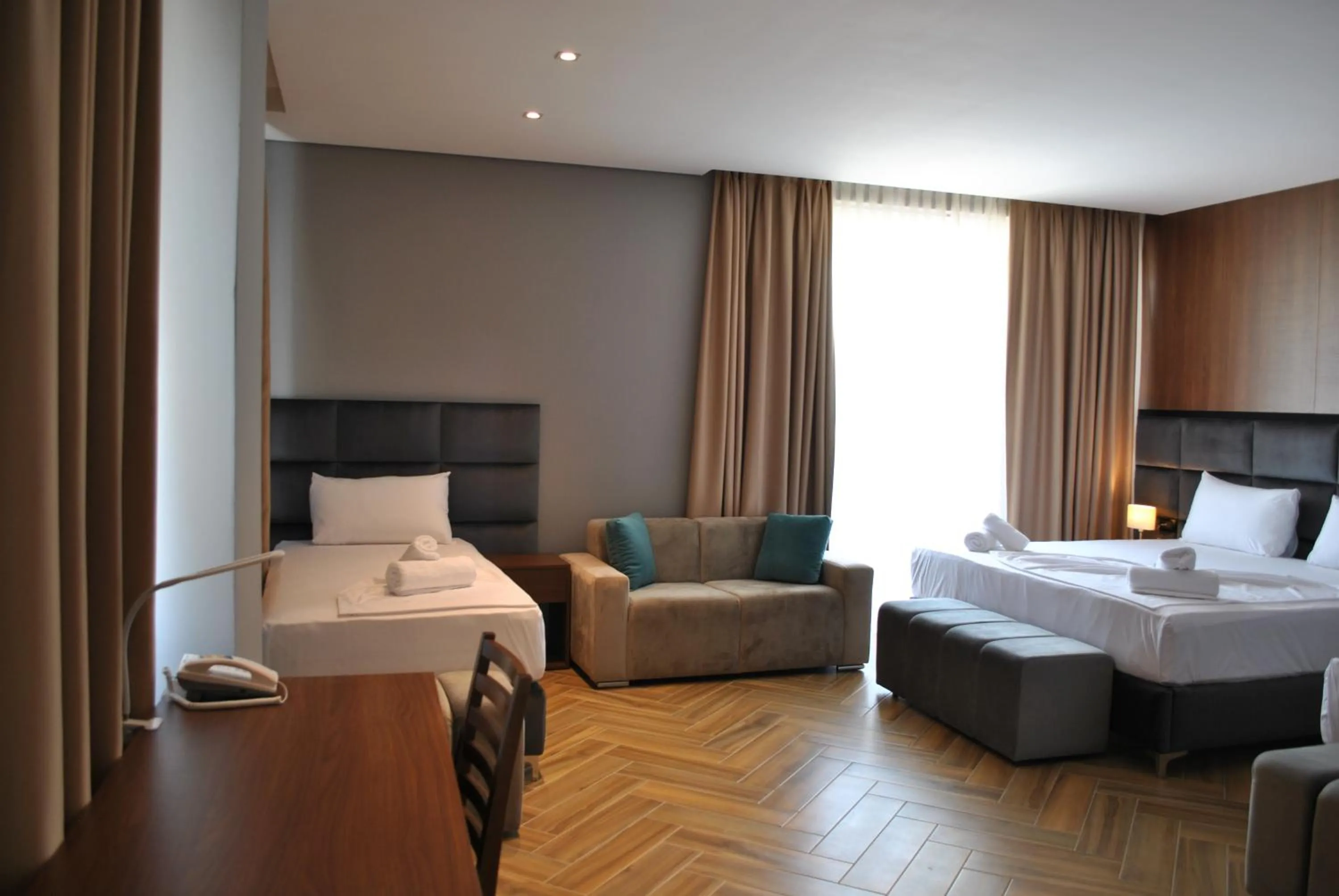 Bed in Twin Towers Hotel City & Beach Resort