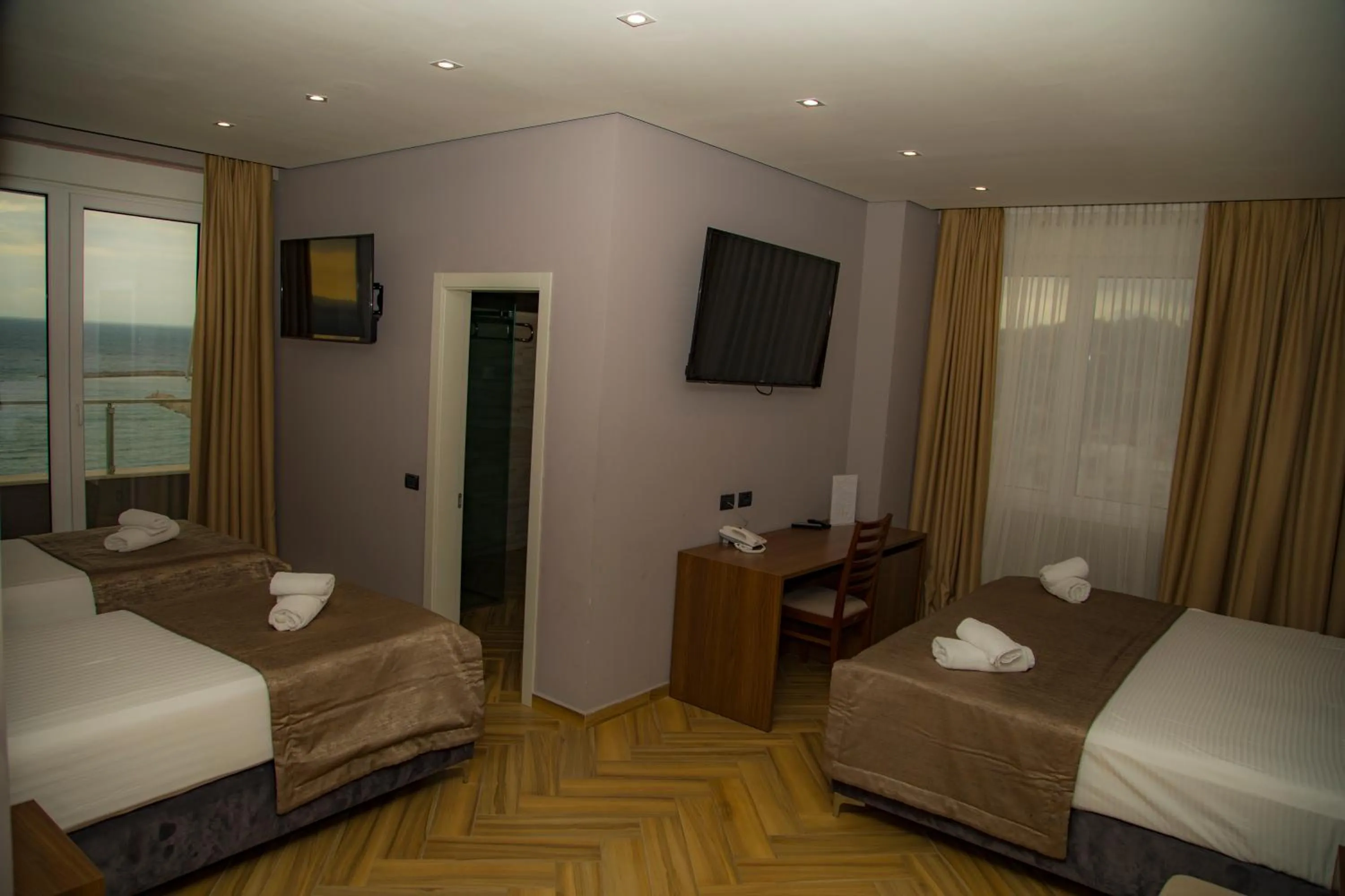 Bed in Twin Towers Hotel City & Beach Resort