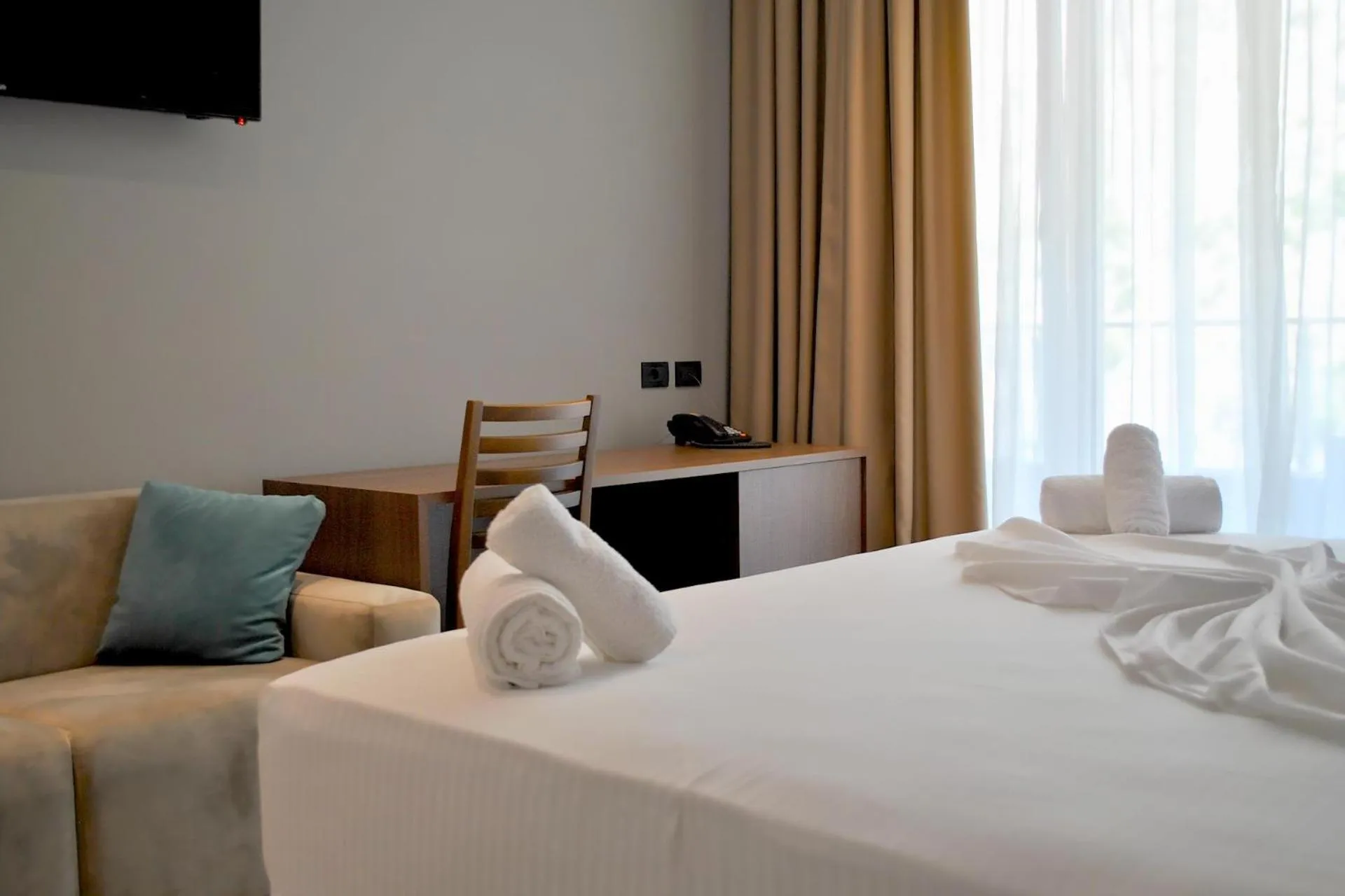 Bed in Twin Towers Hotel City & Beach Resort