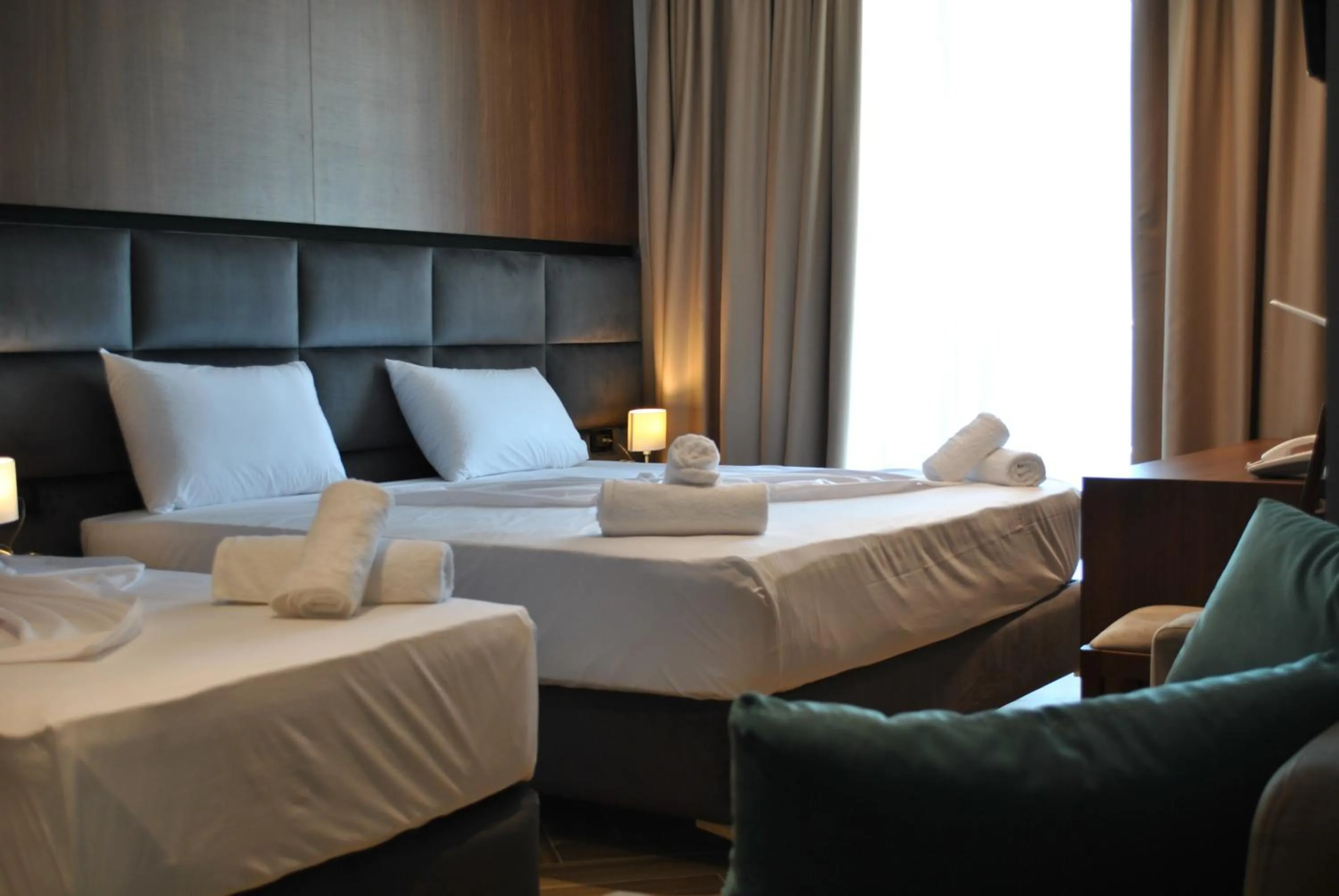 Bed in Twin Towers Hotel City & Beach Resort