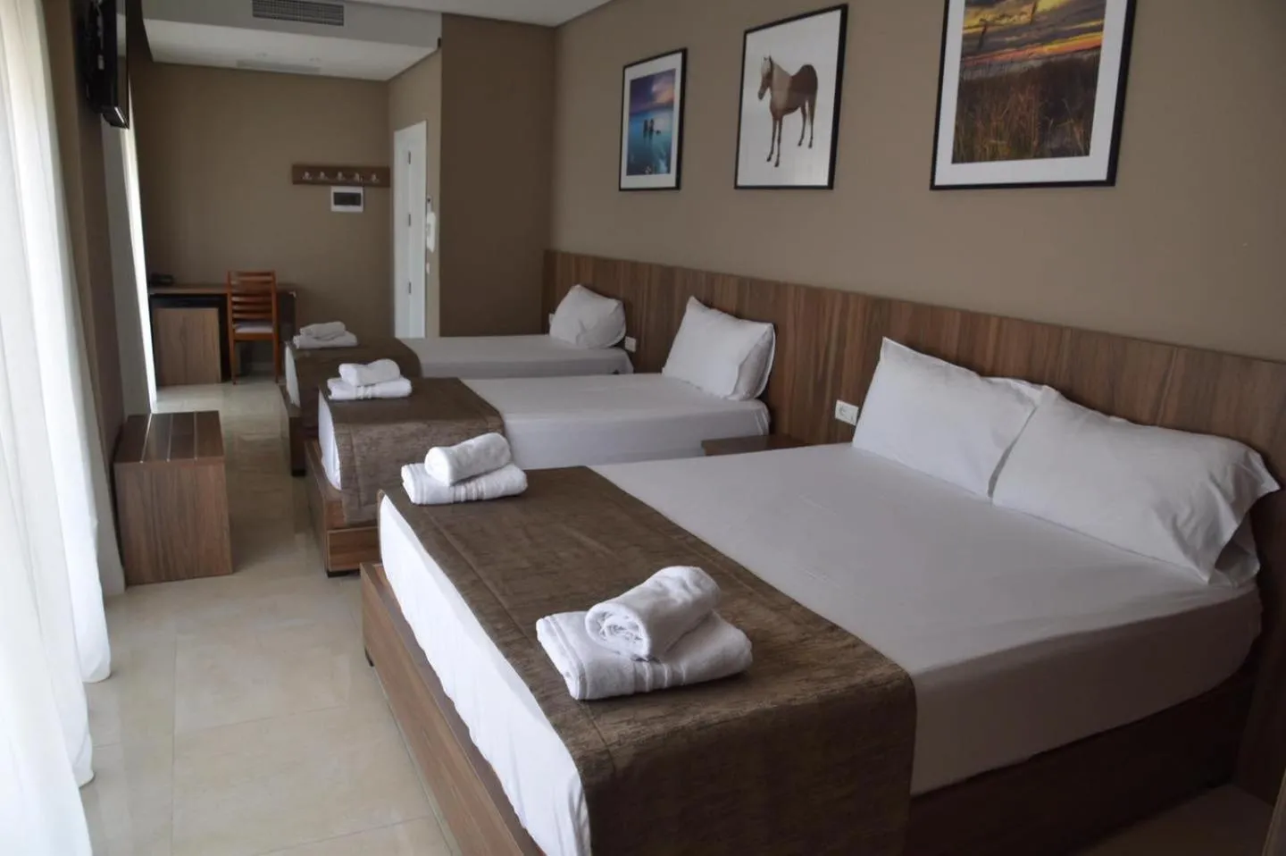 Bed in Twin Towers Hotel City & Beach Resort