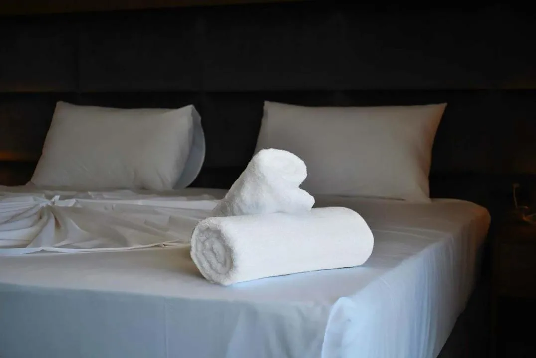Bed in Twin Towers Hotel City & Beach Resort