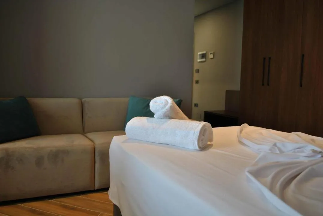 Bed in Twin Towers Hotel City & Beach Resort