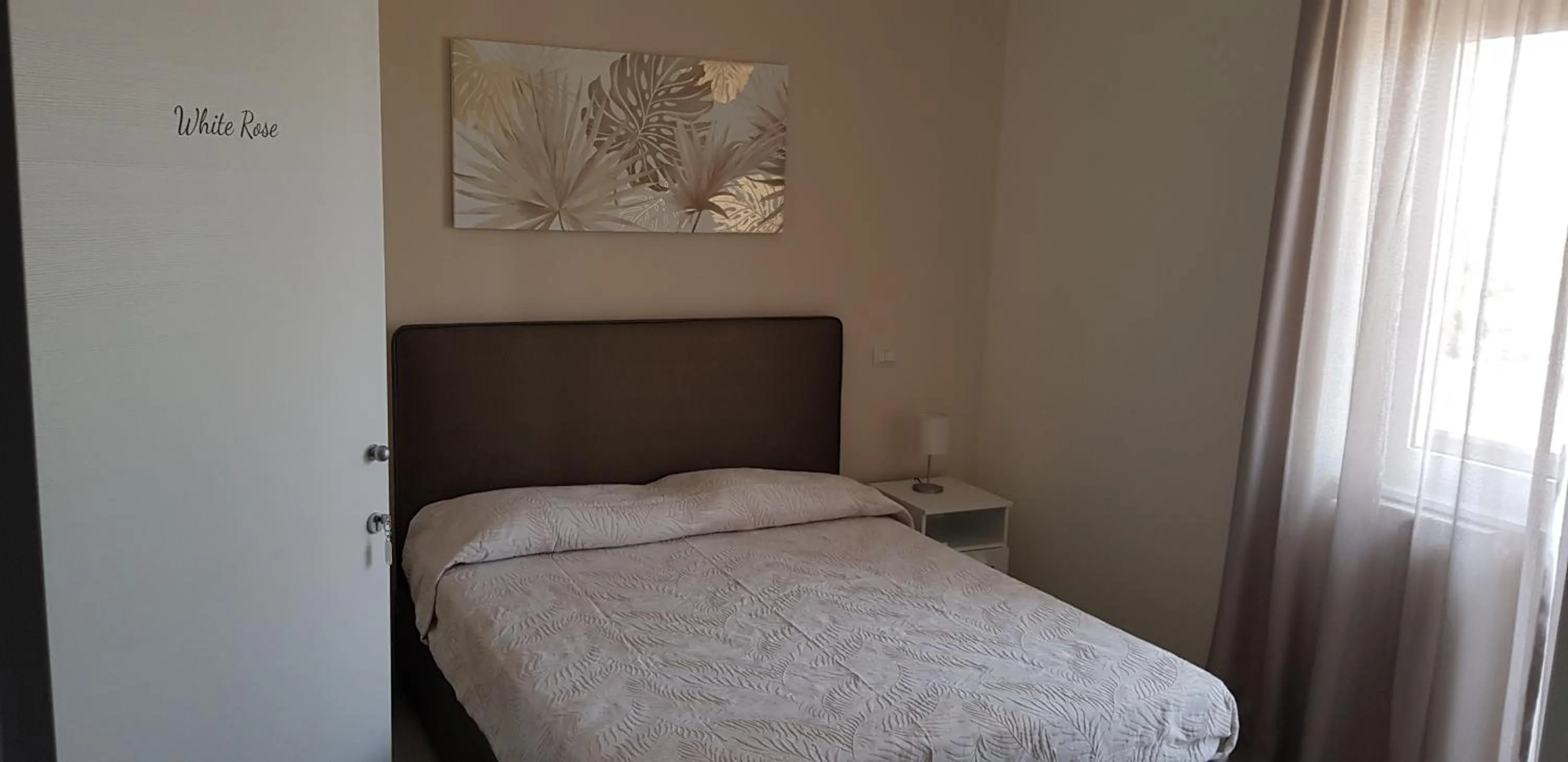 Bed in Little Rose guest house