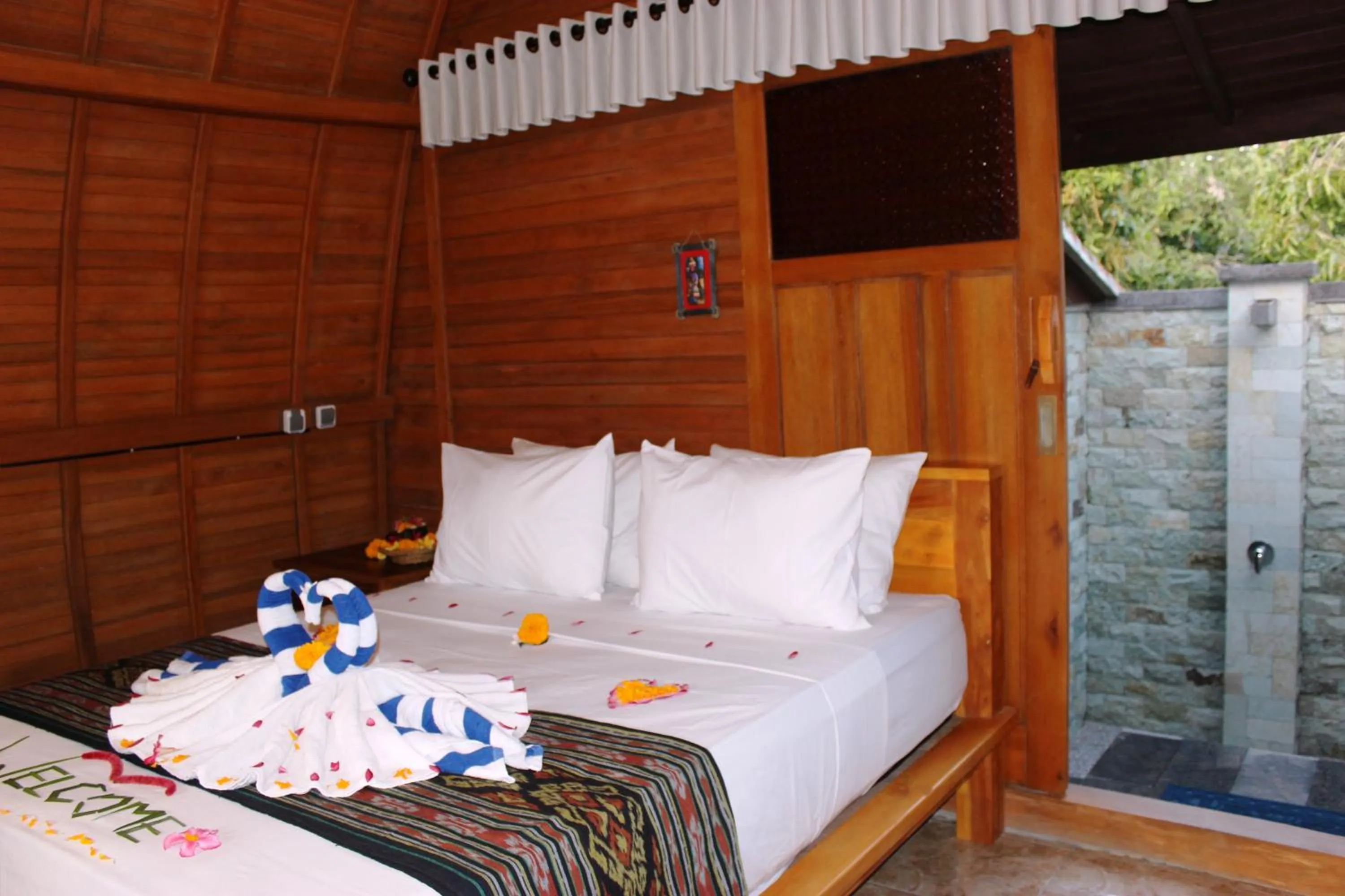 Bed in Kubu Padi Wooden House
