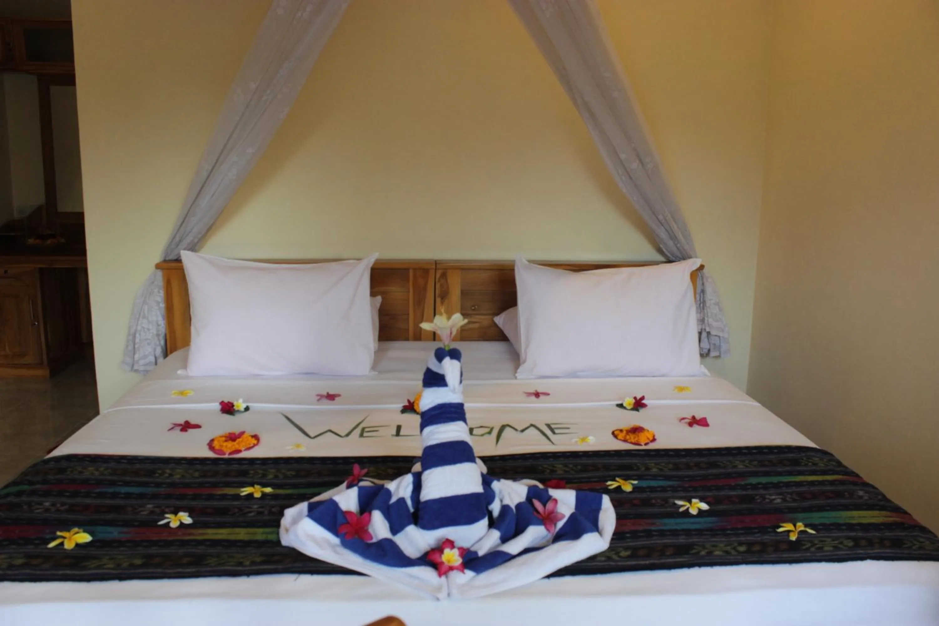 Bed in Kubu Padi Wooden House