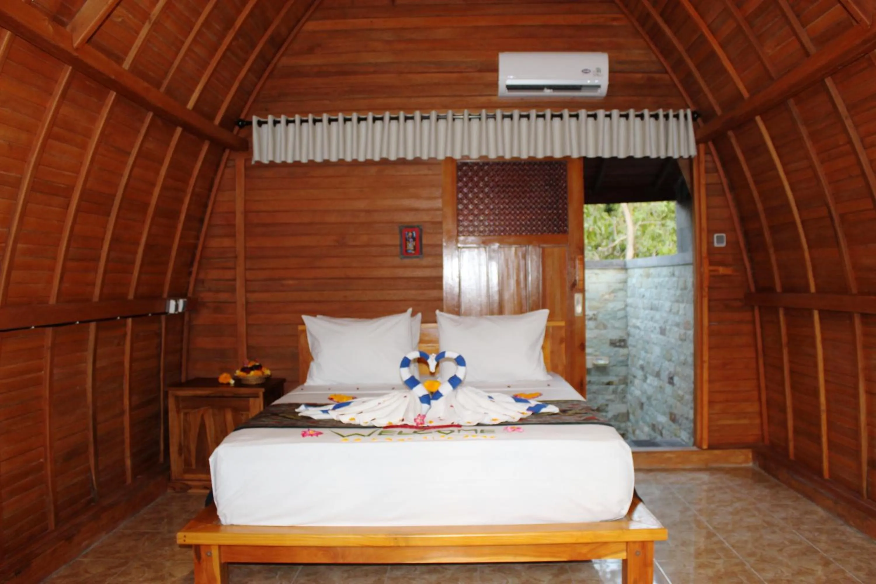 Bed in Kubu Padi Wooden House