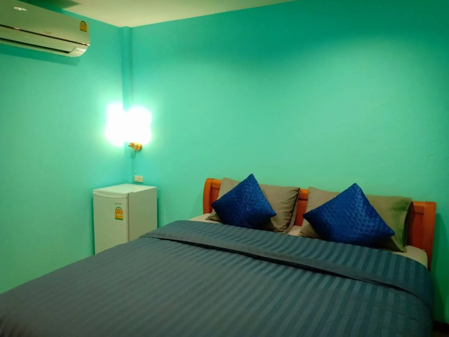 Photo of the whole room, Bed in Siri Guesthouse