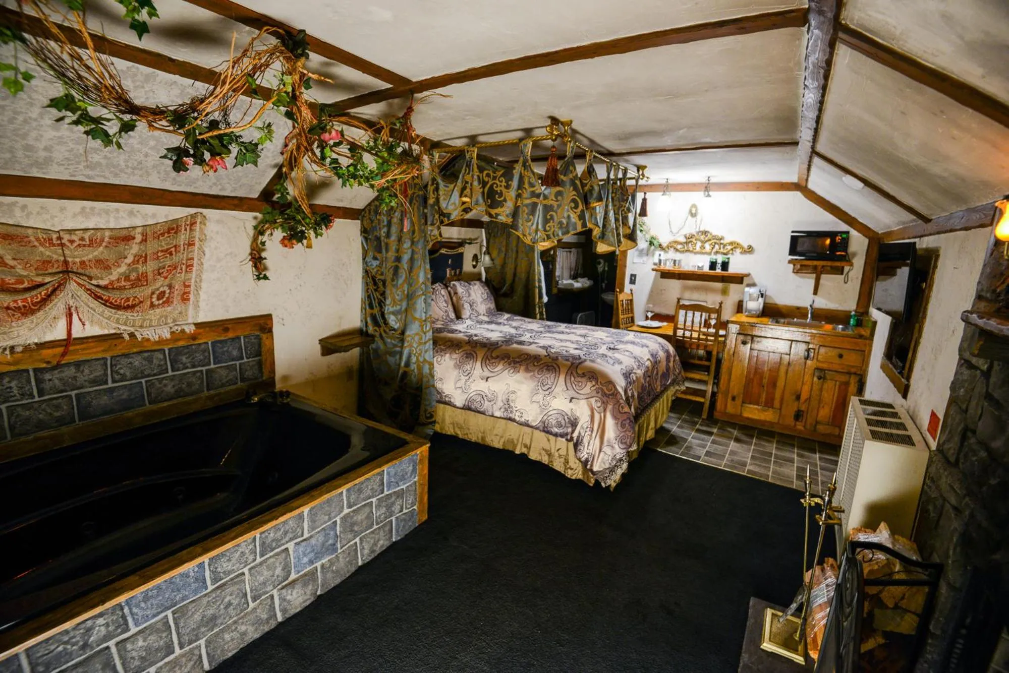 Bed in Castle Wood Theme Cottages- COUPLES ONLY
