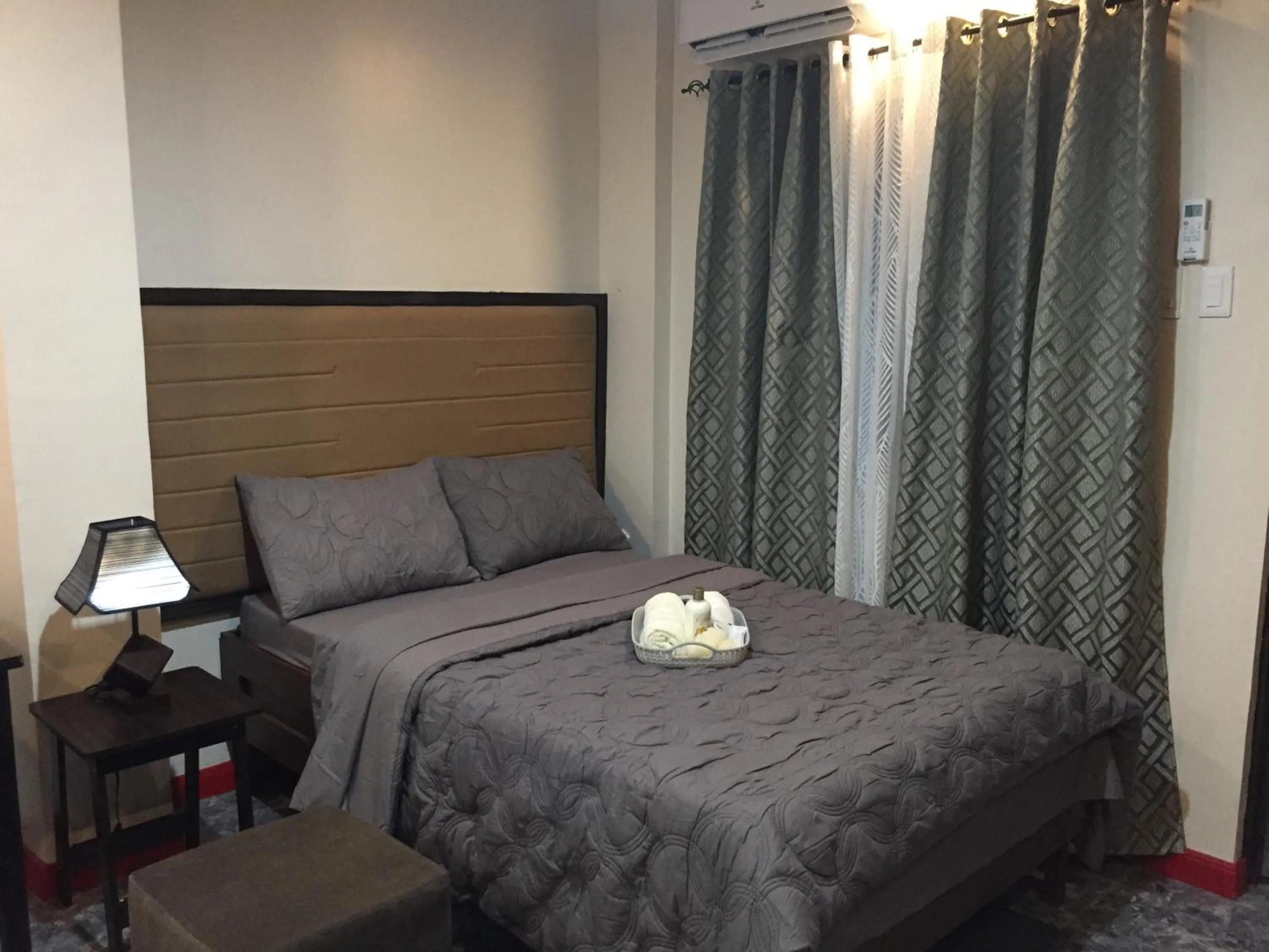Bed in MIRASOL Residences