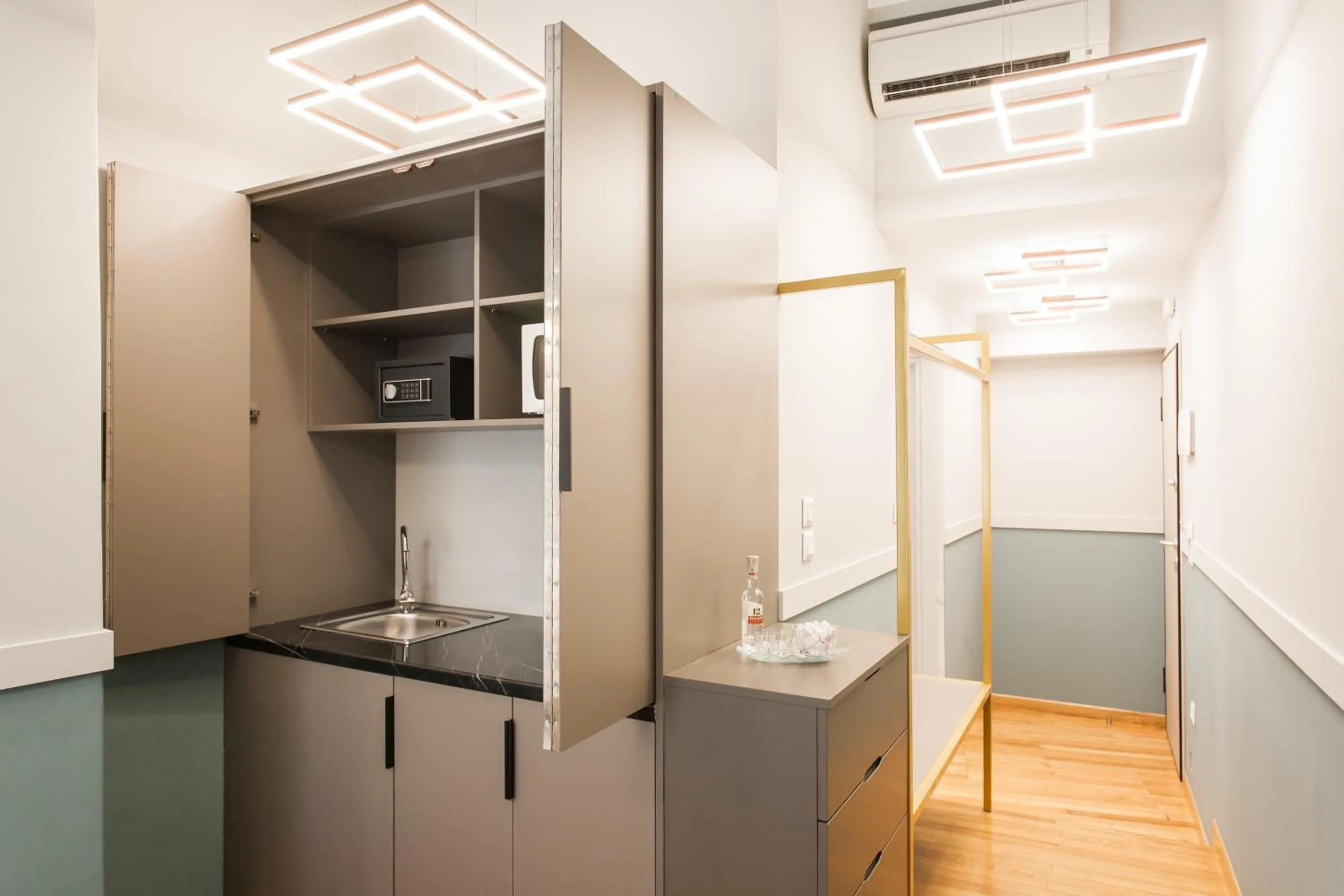 Kitchen or kitchenette in Step One | Luxury Suites right in the heart of Acropolis next to metro station