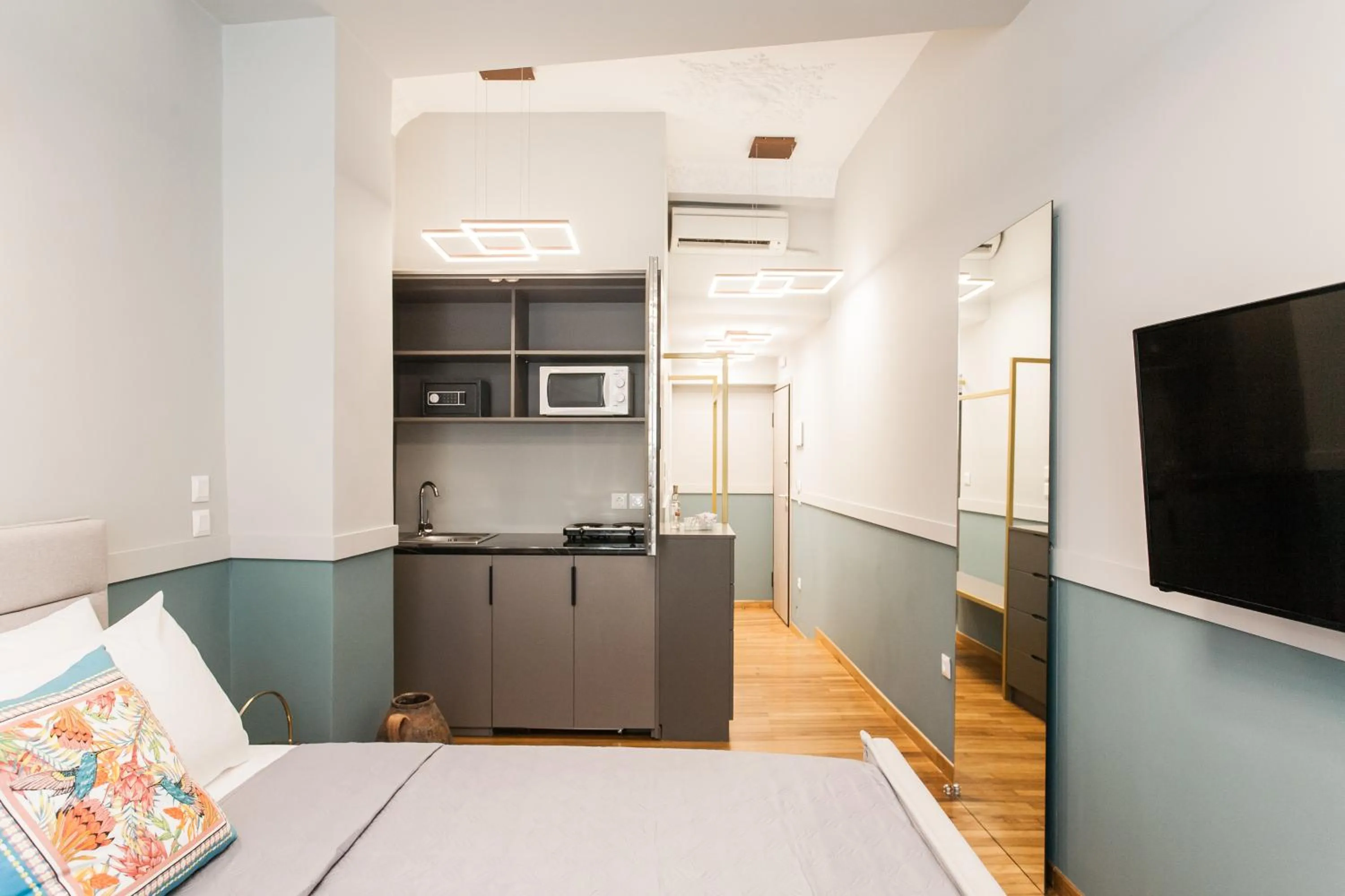 Bed in Step One | Luxury Suites right in the heart of Acropolis next to metro station