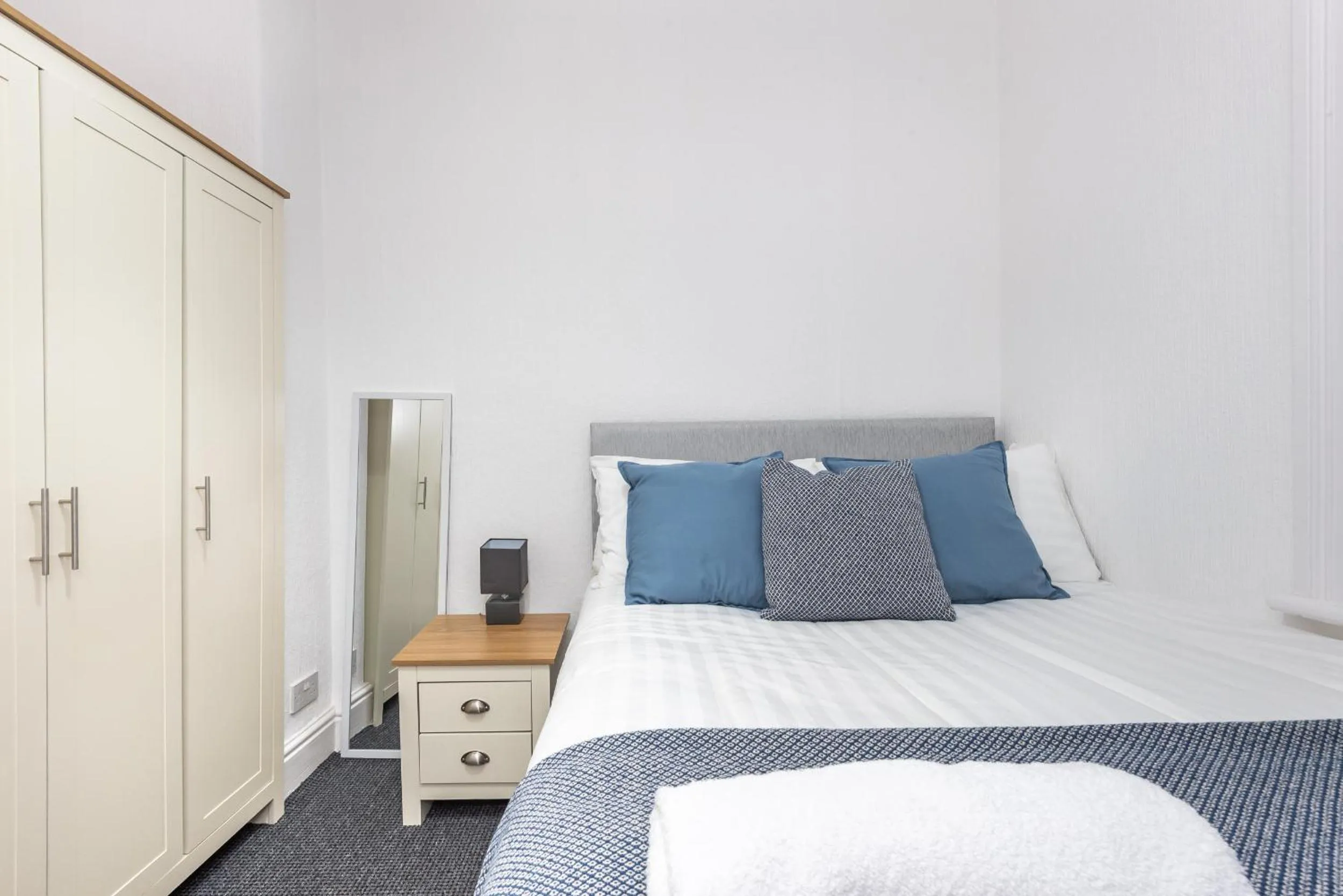 Bedroom in Velvet Coaster Apartments