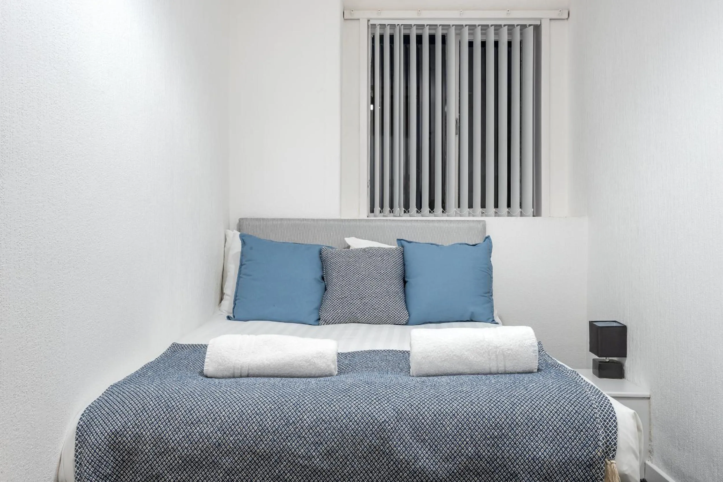 Bedroom in Velvet Coaster Apartments