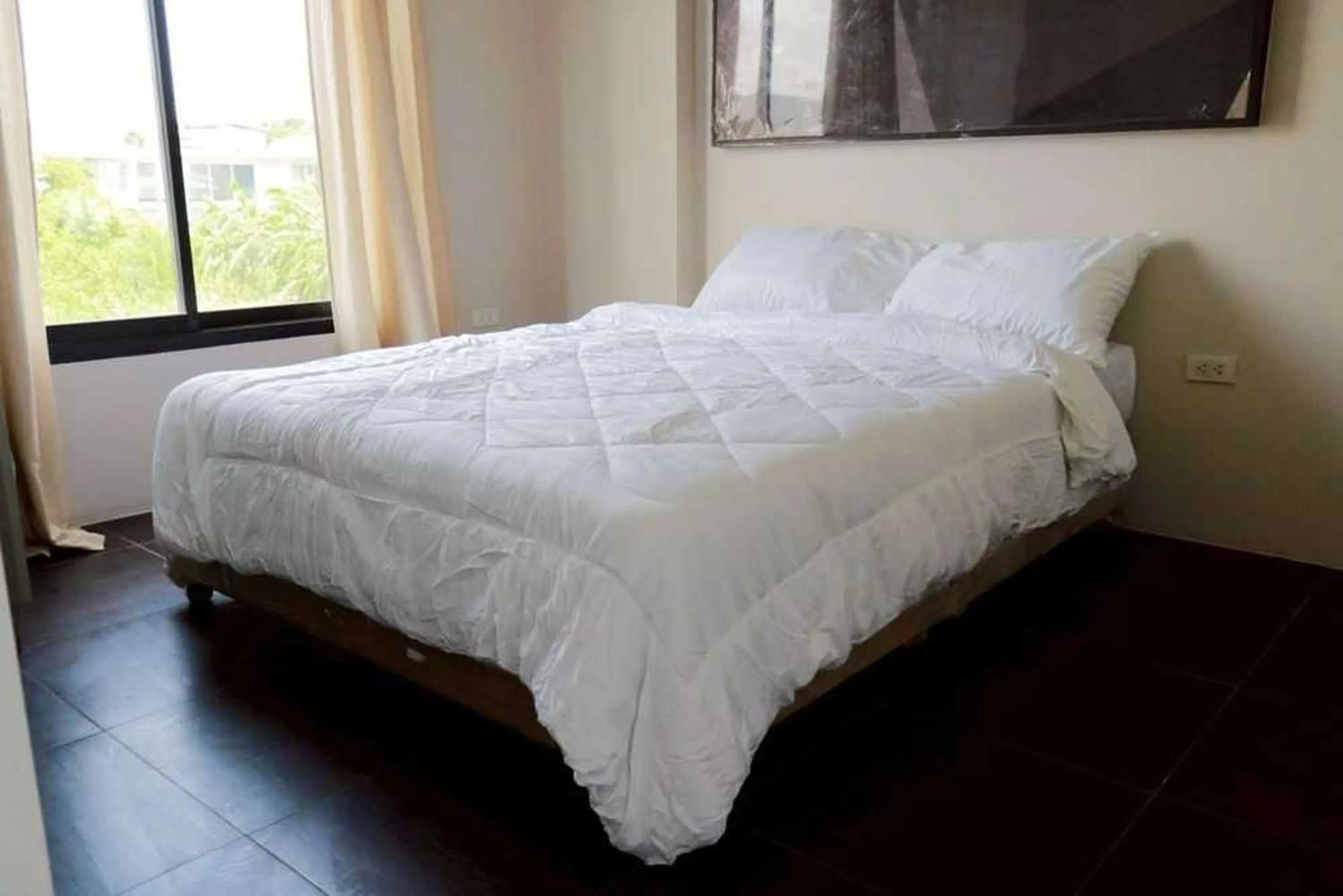 Bed in RQ Bangkok Sukhumvit 107 by Collection O