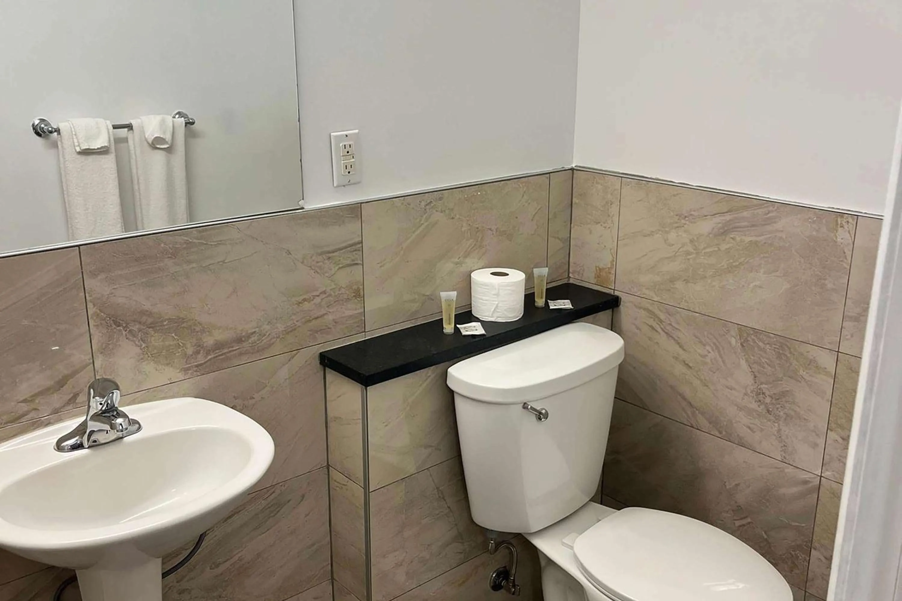 Bathroom in Super 8 by Wyndham Montreal