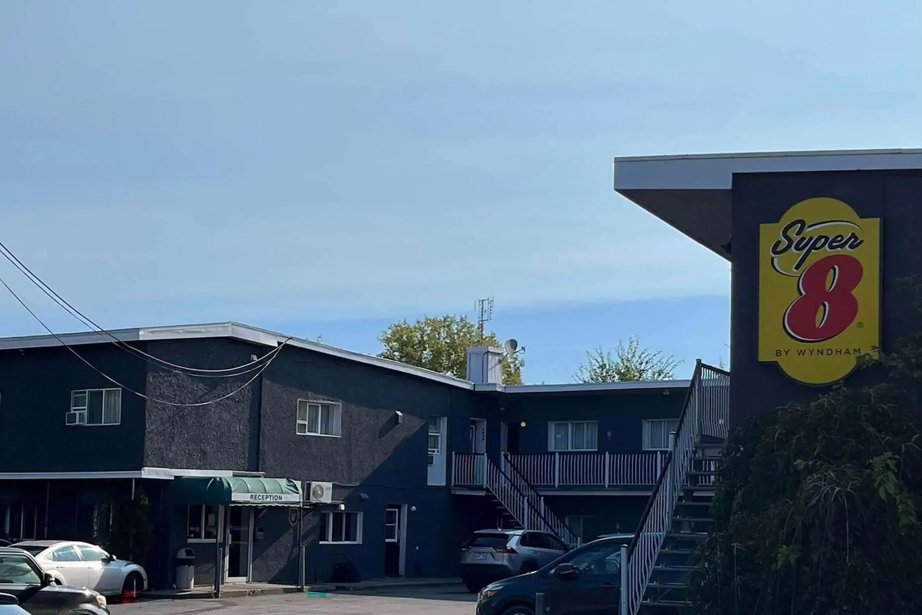 Property building in Super 8 by Wyndham Montreal Property building in Super 8 by Wyndham Montreal