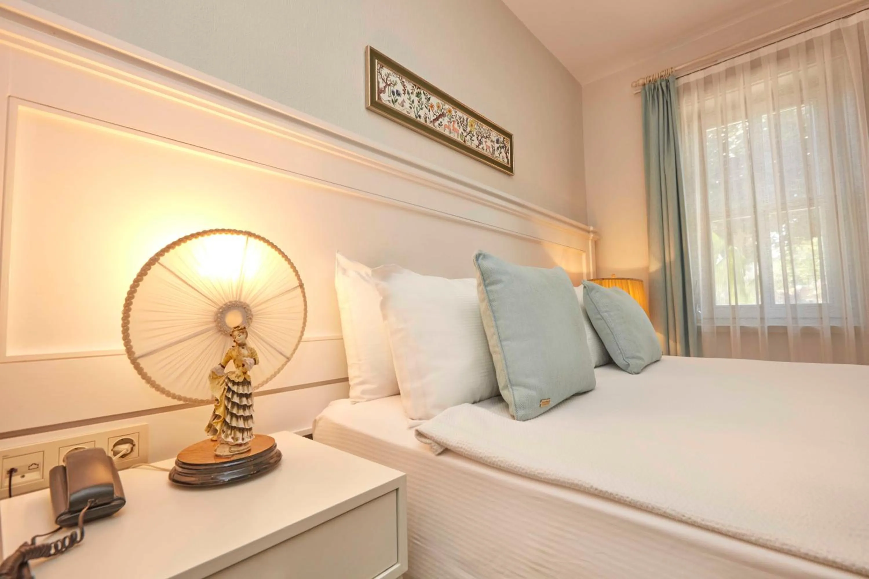 Bed in AlaBora Hotel