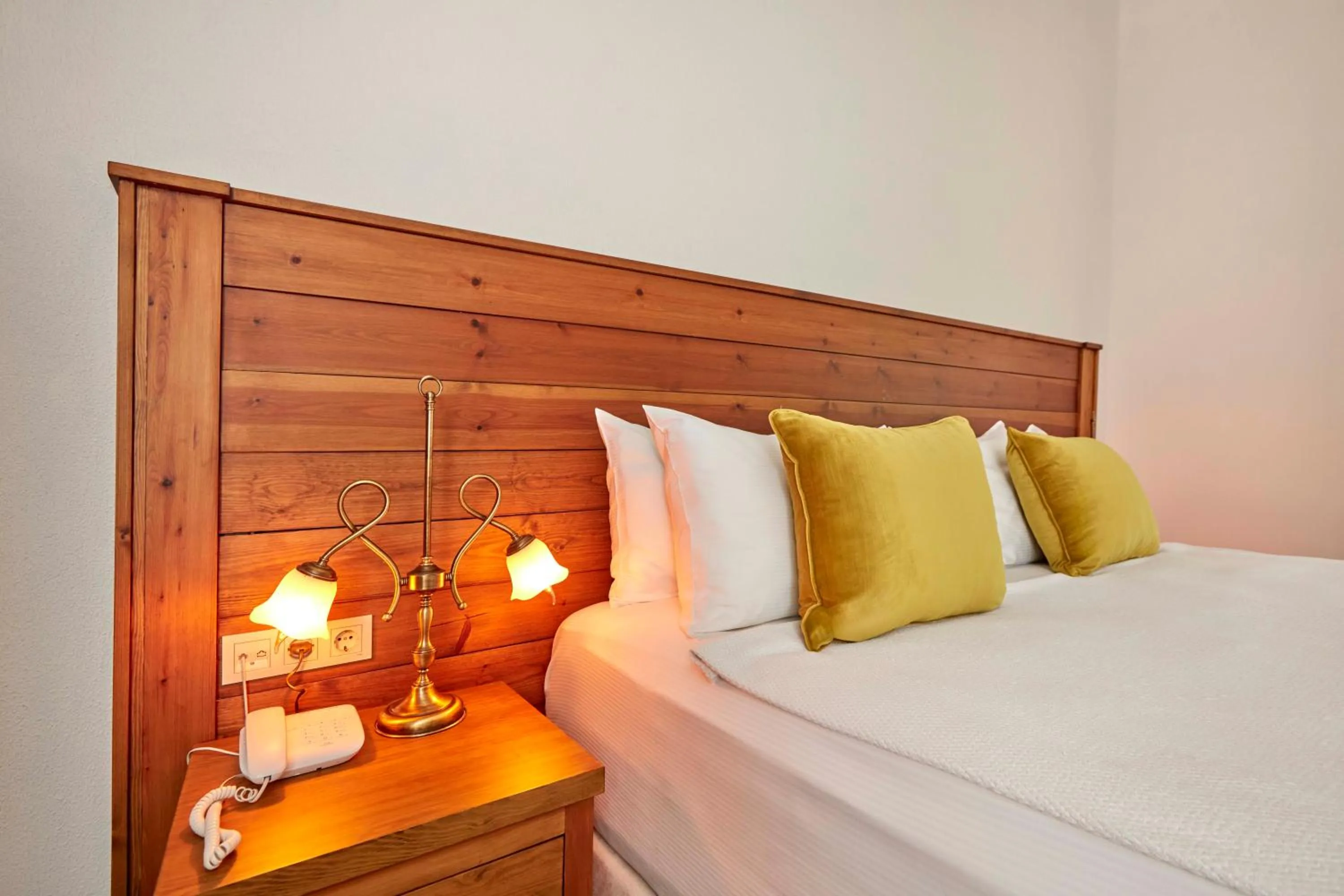 Bed in AlaBora Hotel