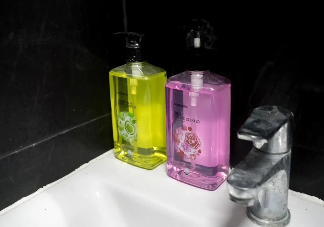 Bathroom in RoomQuest Bangkok Ratchada