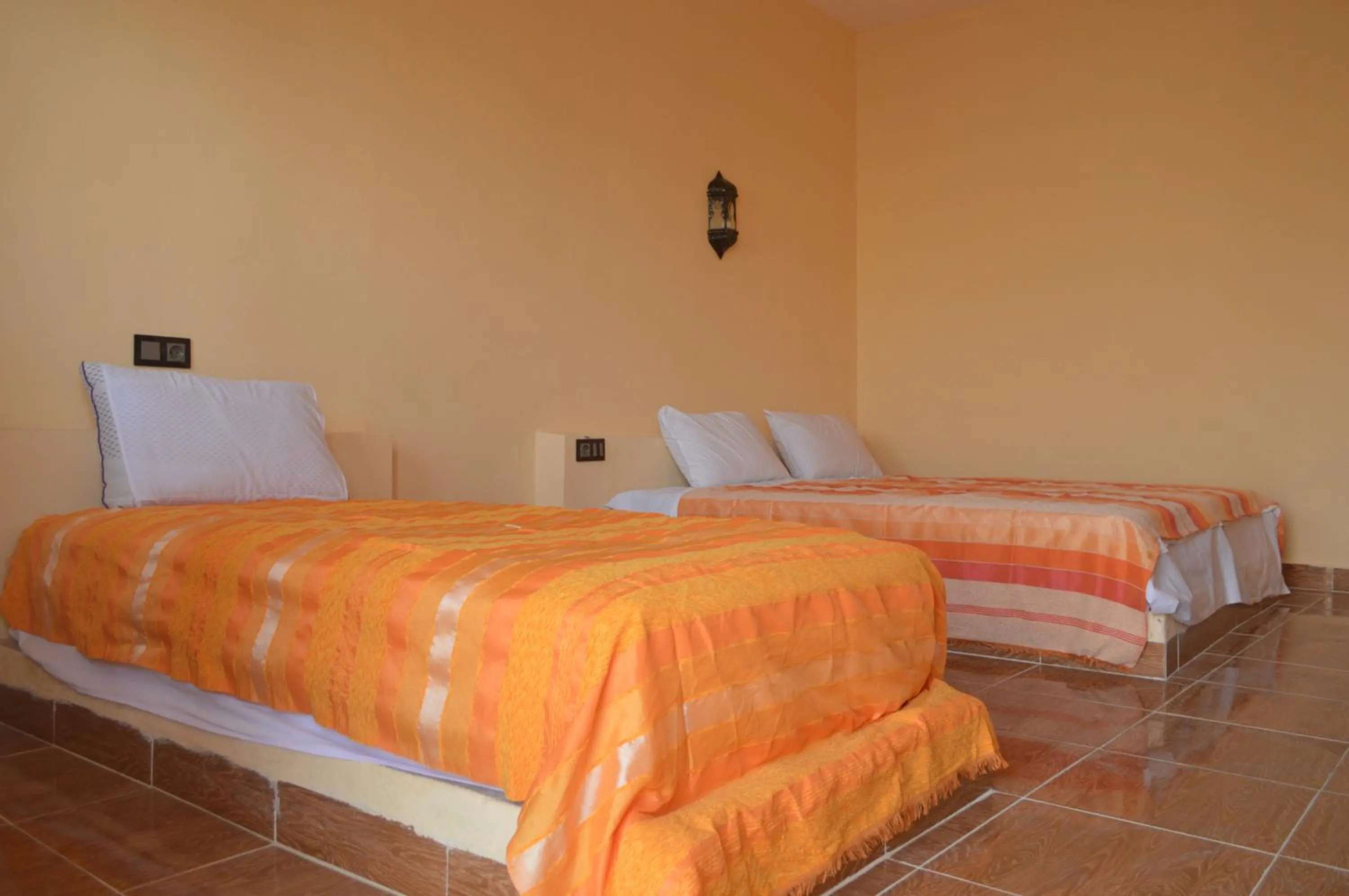 Photo of the whole room, Bed in Riad Hotel Les Flamants