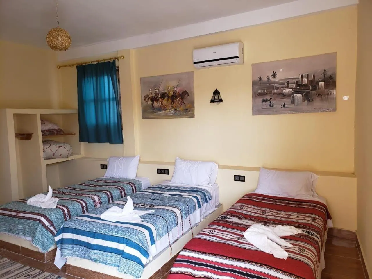 Bed in Riad Hotel Les Flamants